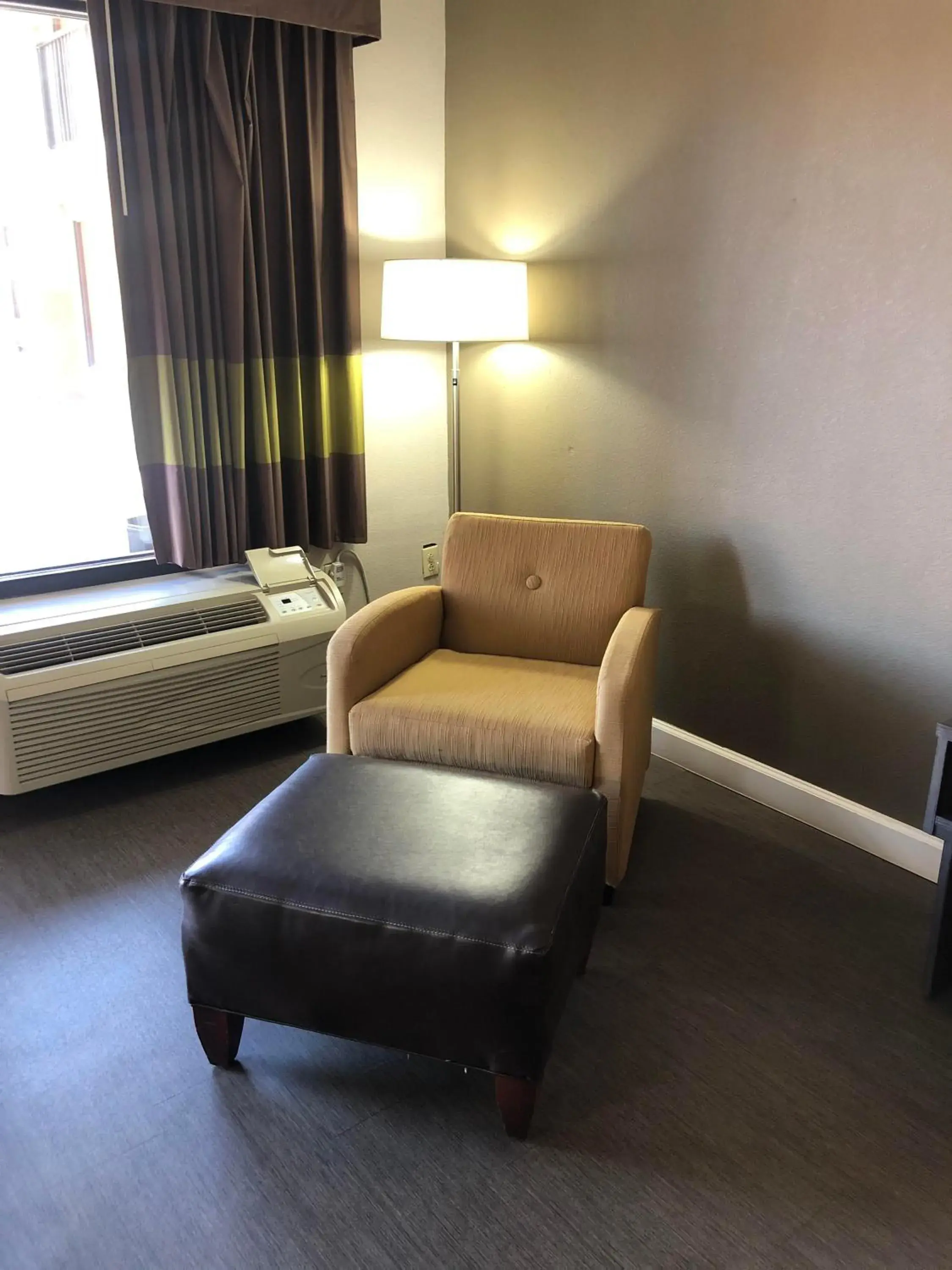 Seating Area in Super 8 by Wyndham Orangeburg Near I-26