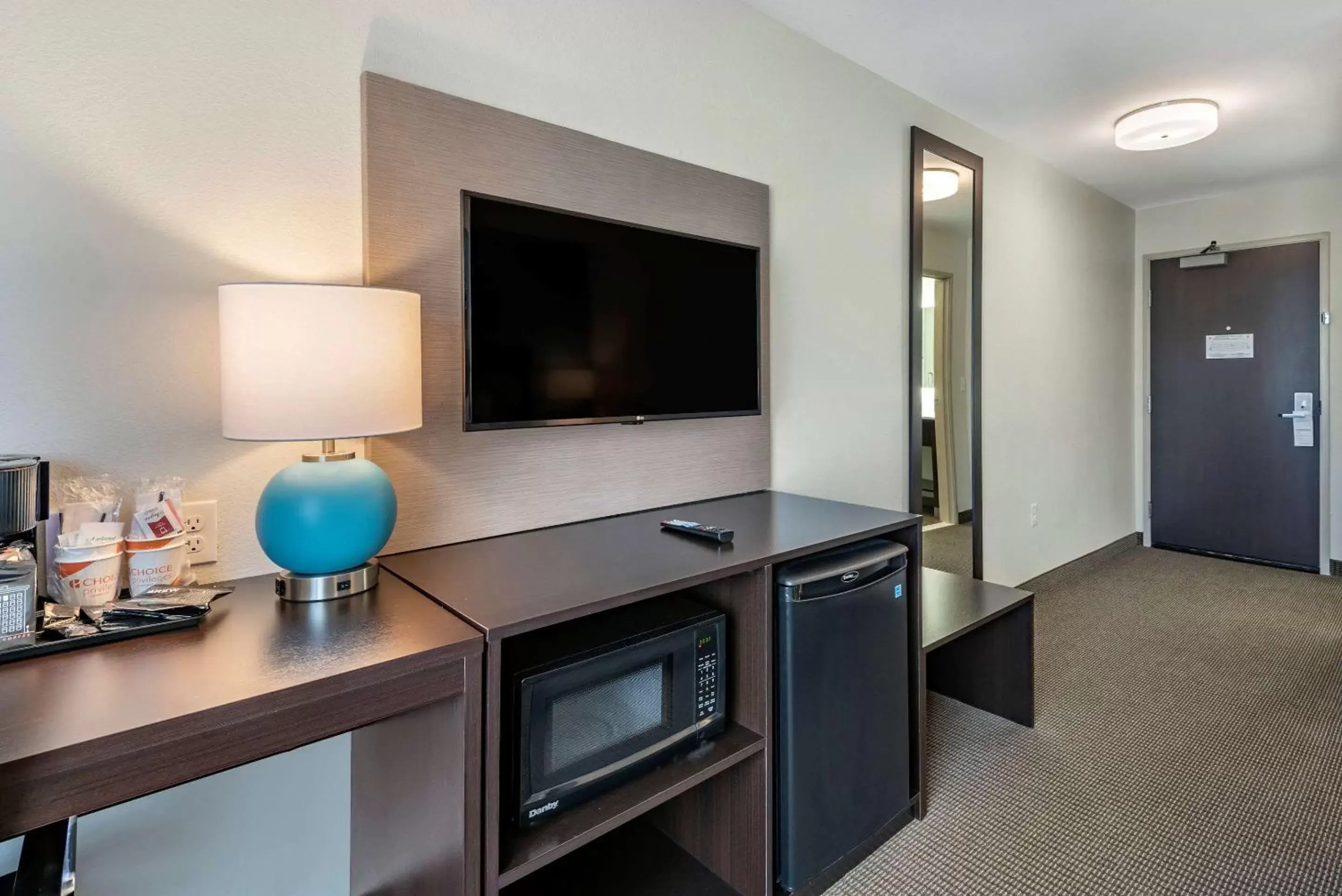 Photo of the whole room, TV/Entertainment Center in Sleep Inn Durango