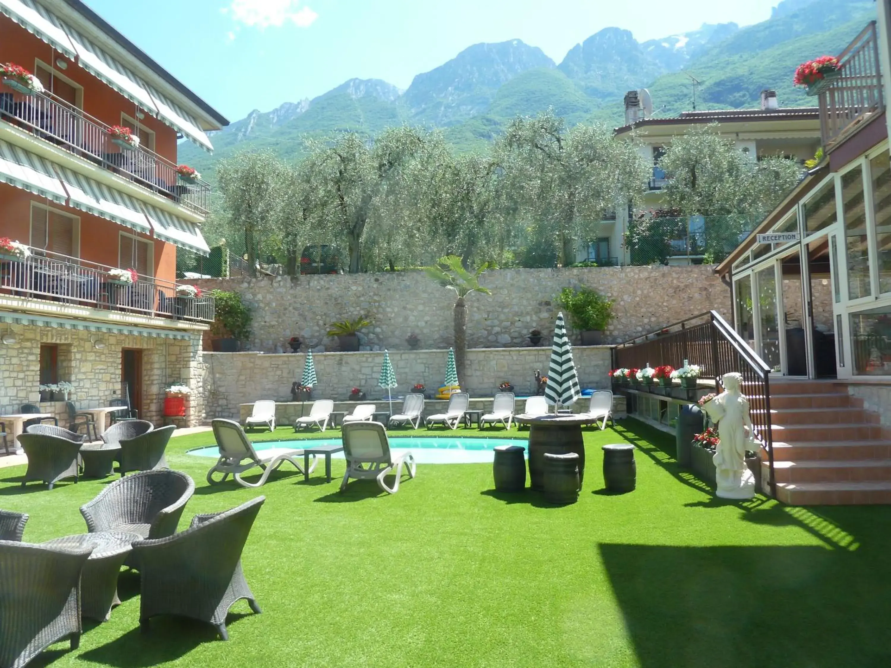 Garden view, Swimming Pool in Albergo Casa Este