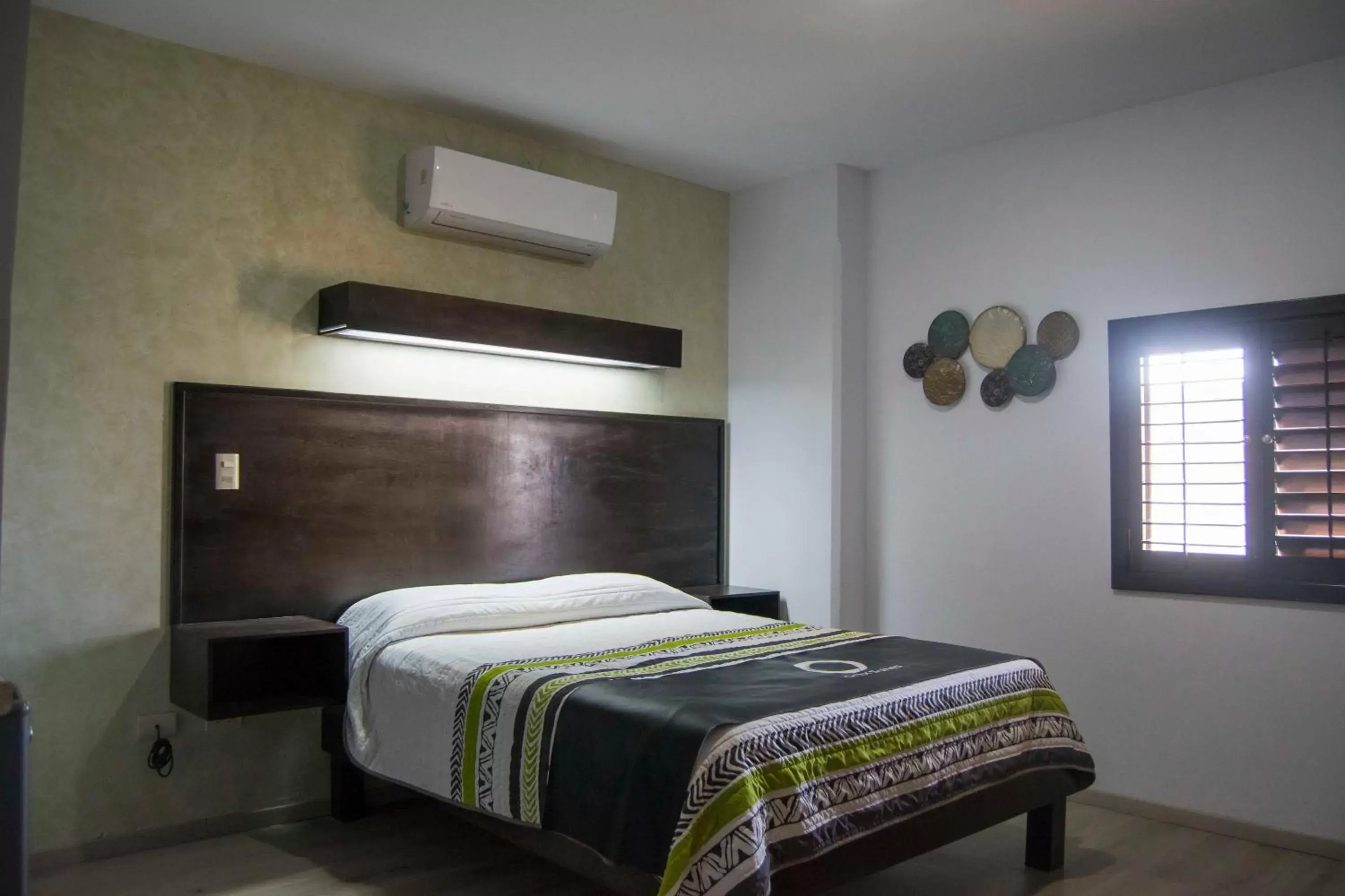 Bed in Hotel Onix Suites