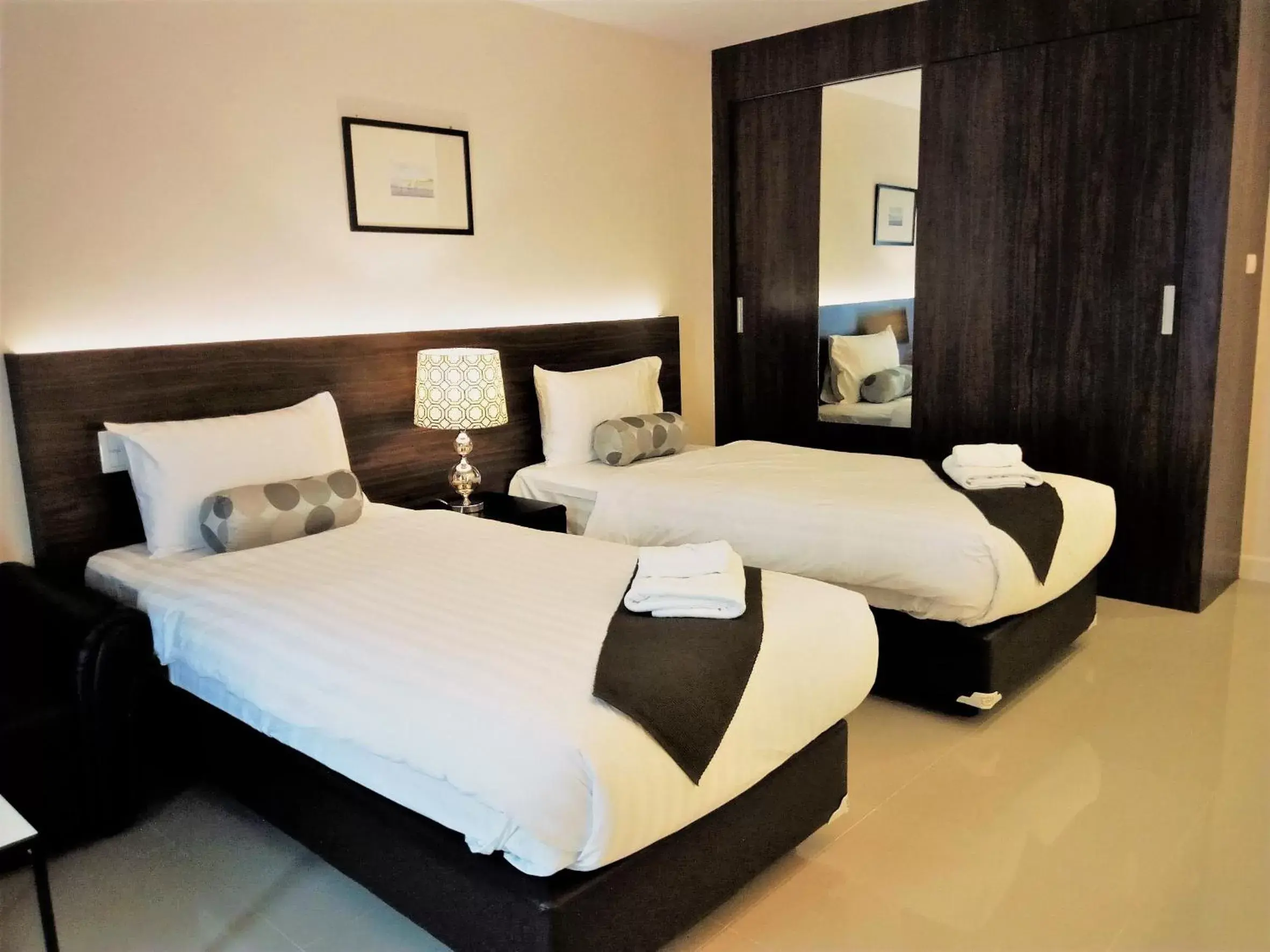 Standard Twin Room with Sofa in The Harmony Ville Standard Twin Room with Sofa in The Harmony Ville