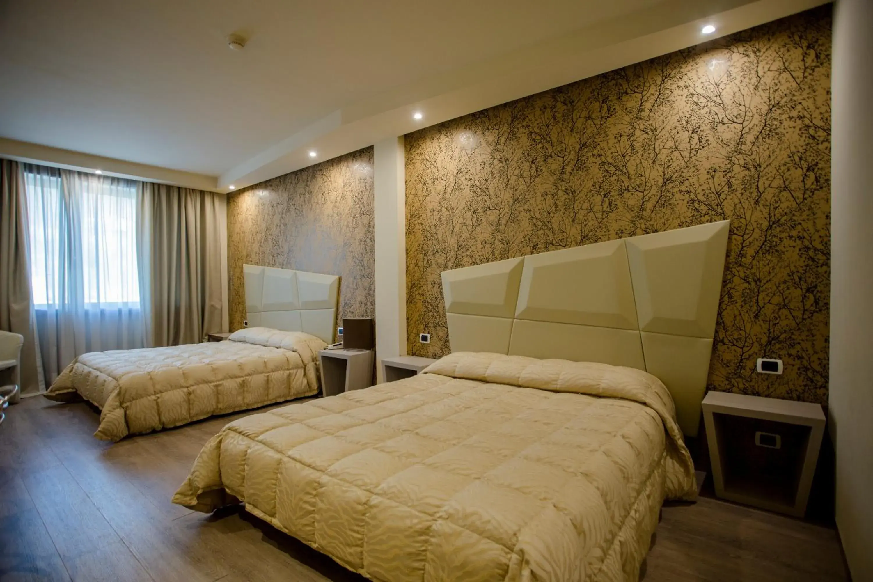 Bed in Hostellerie Du Cheval Blanc