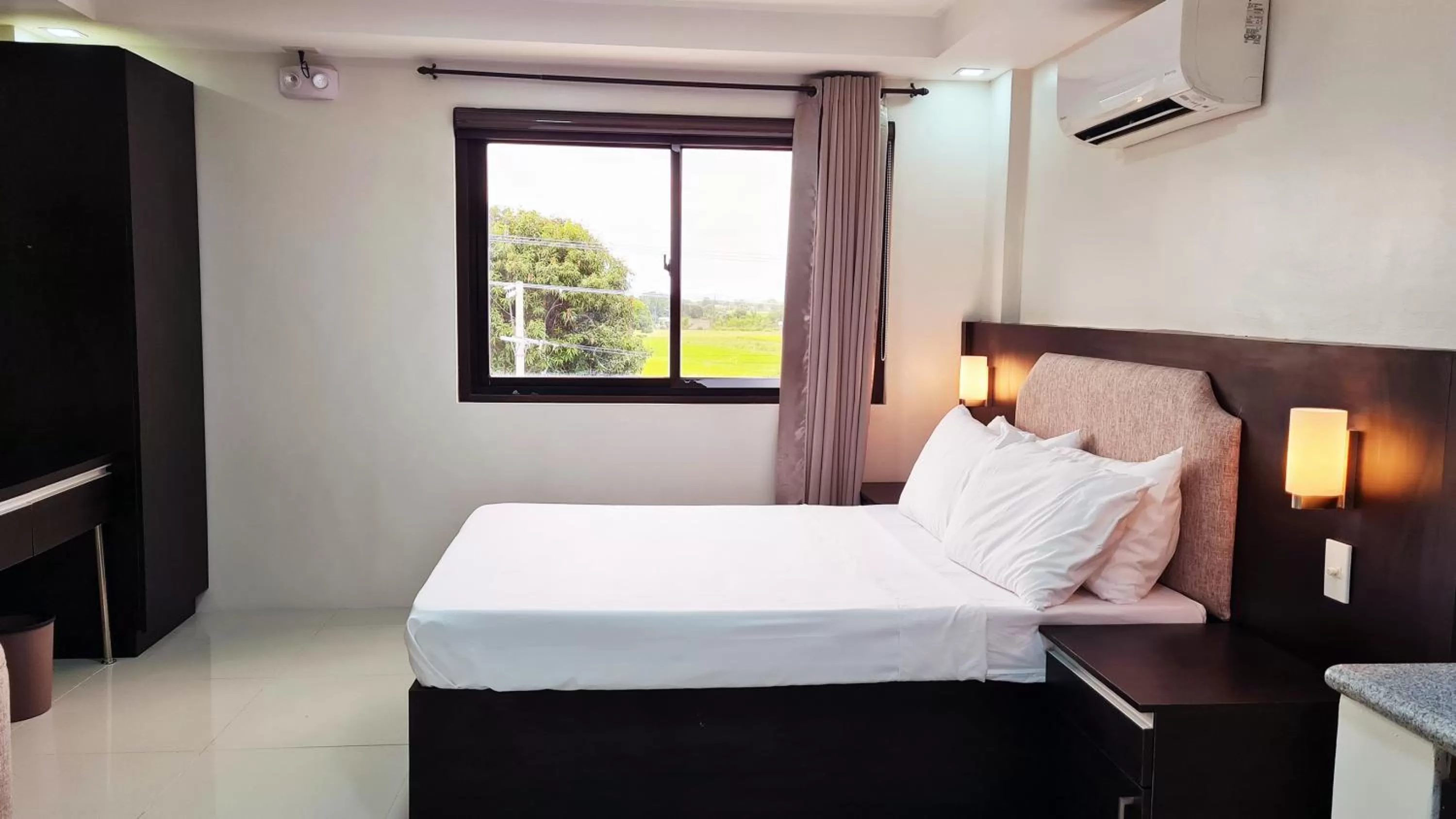 Bed in Staycation Hotel