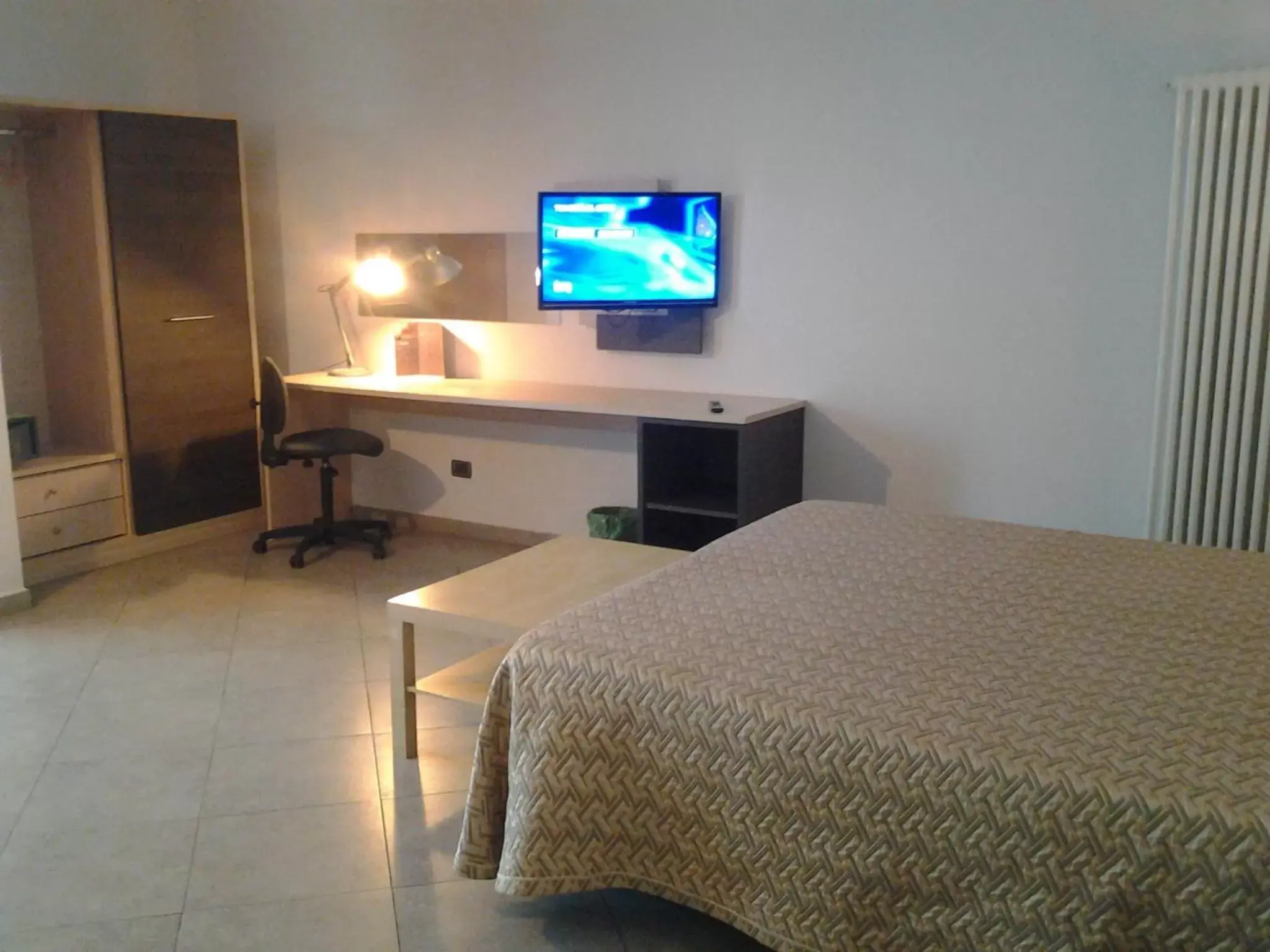 TV and multimedia, TV/Entertainment Center in Hotel Lux