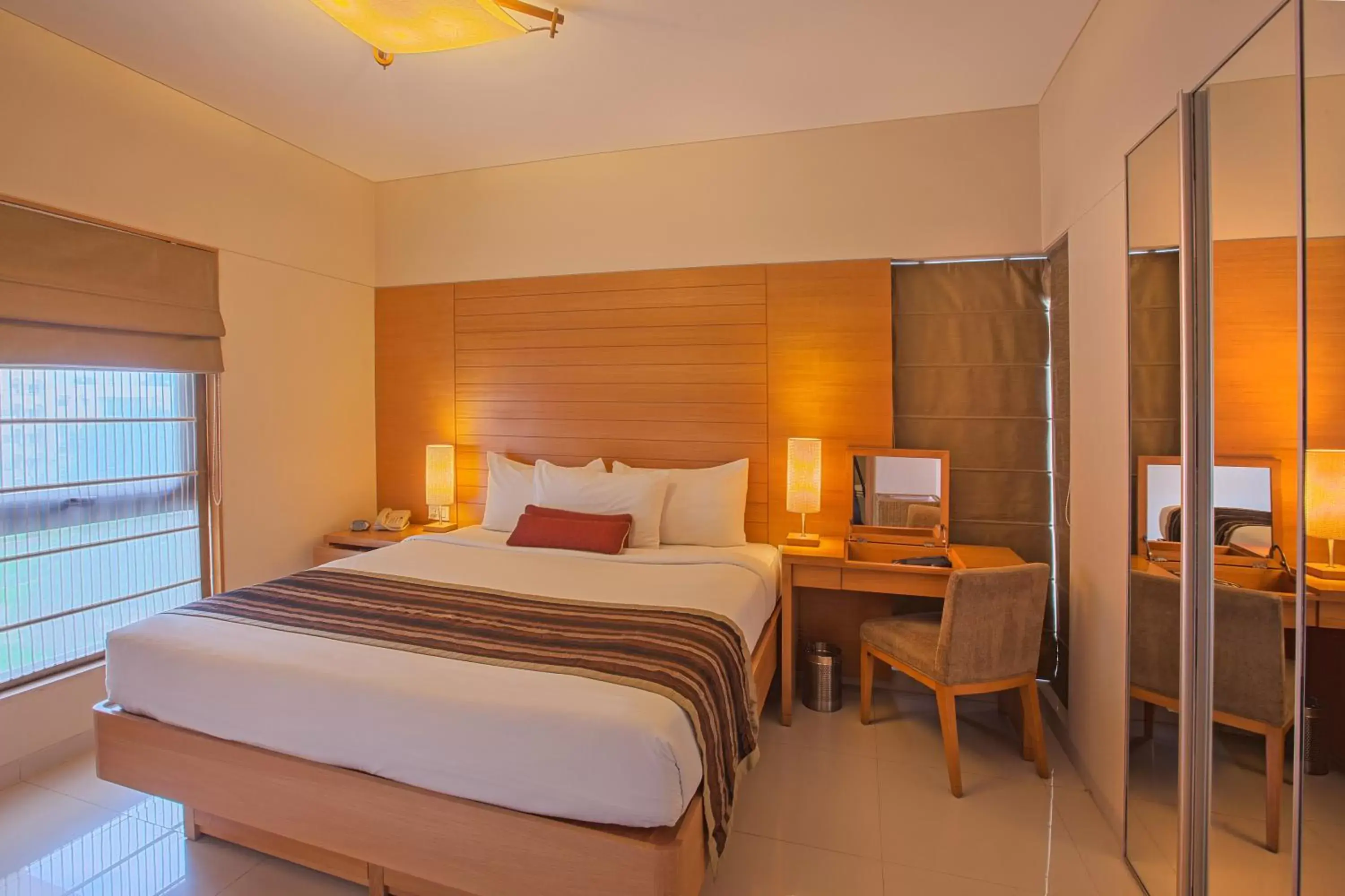 Bedroom, Bed in Oakwood Residence Naylor Road Pune