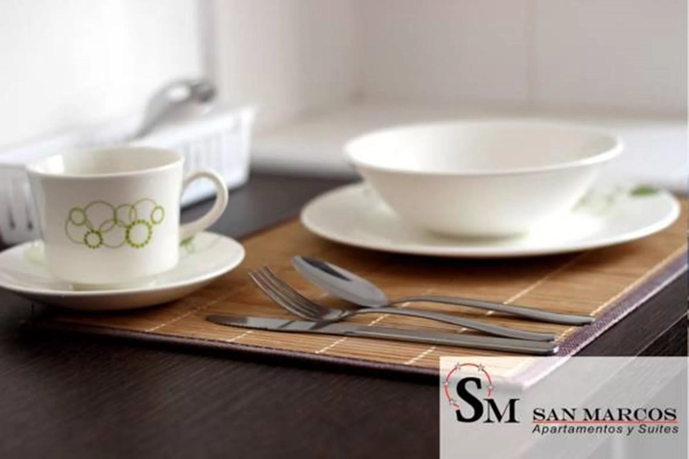 Kitchen or kitchenette in Apartasuites San Marcos