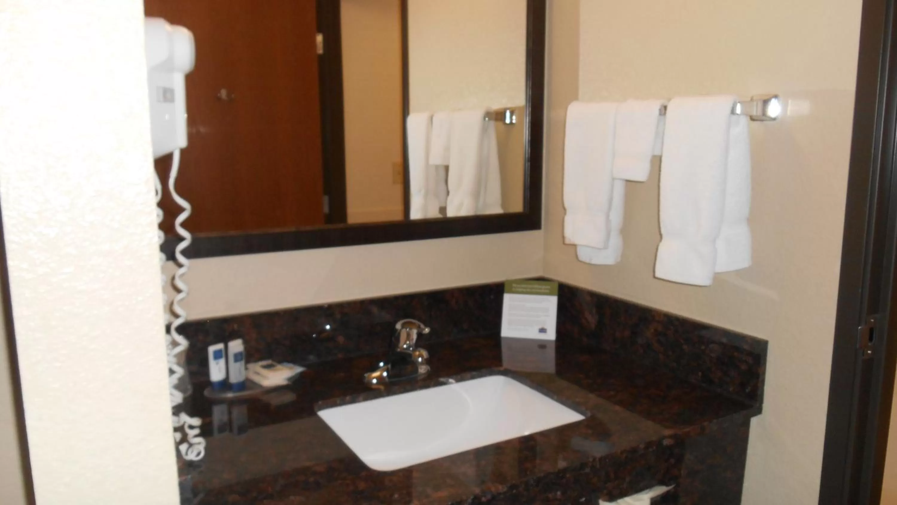 Bathroom in AmericInn by Wyndham New London