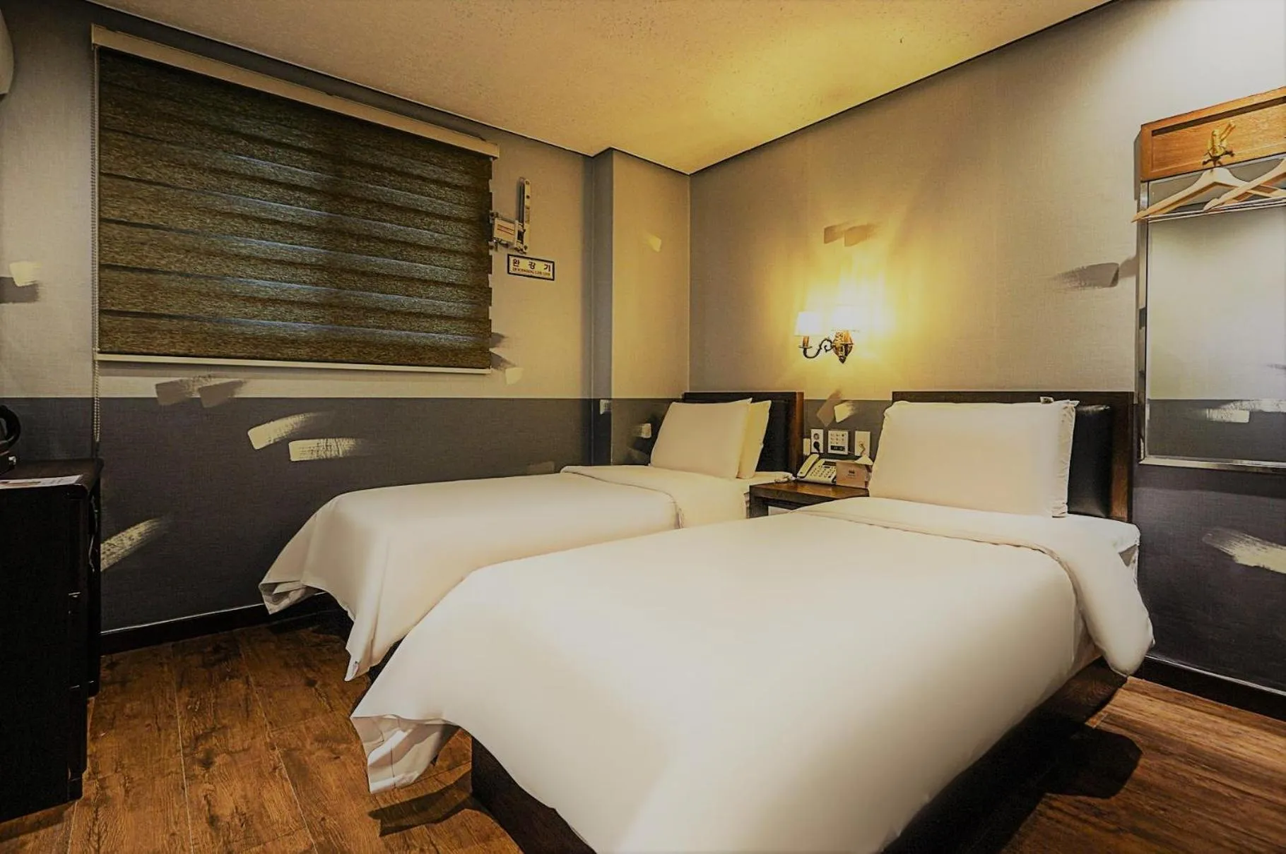 Bed in Friendly DH Naissance Hotel by Mindrum Group