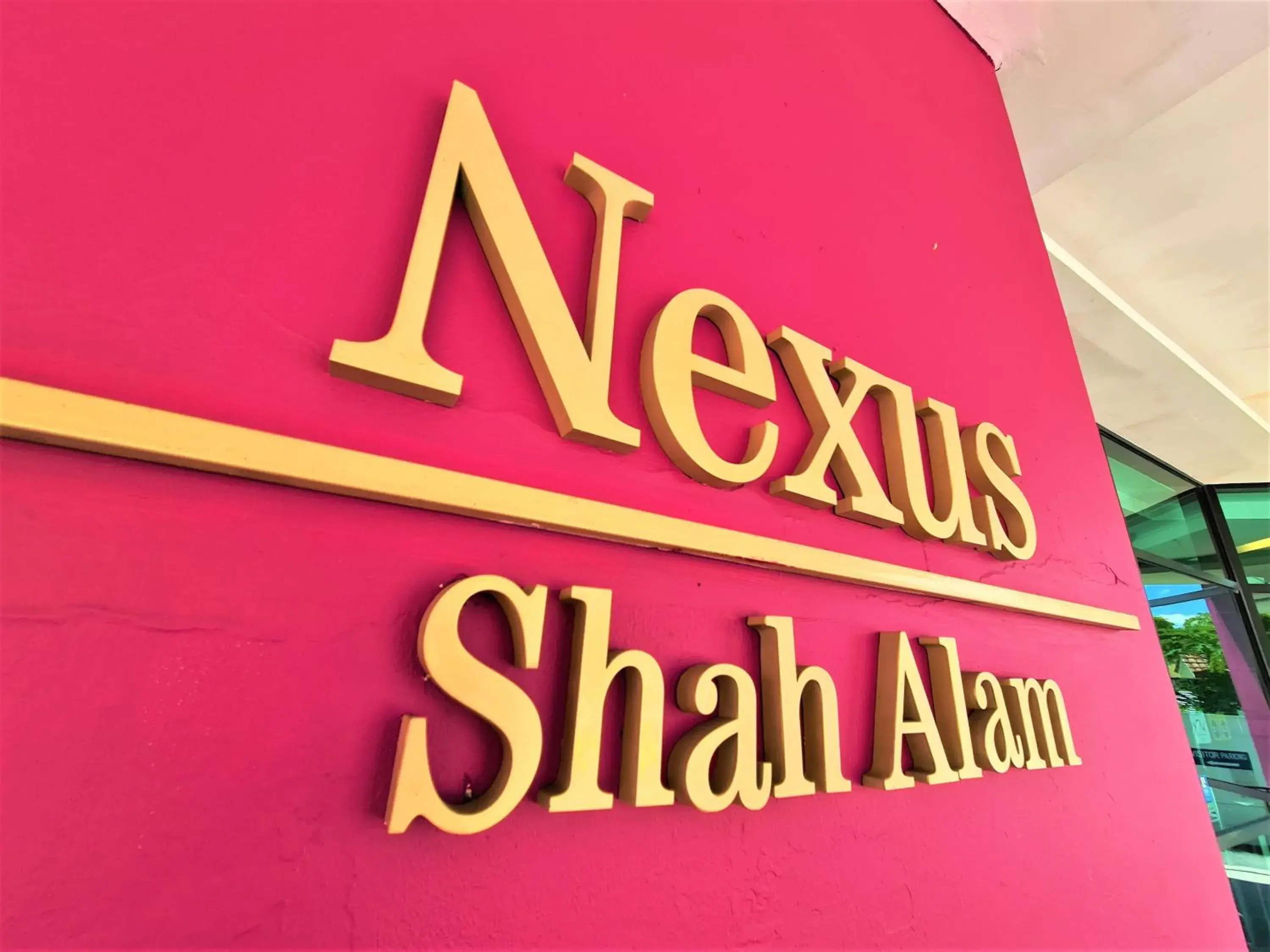 Property logo or sign in Nexus Regency Suites & Hotel