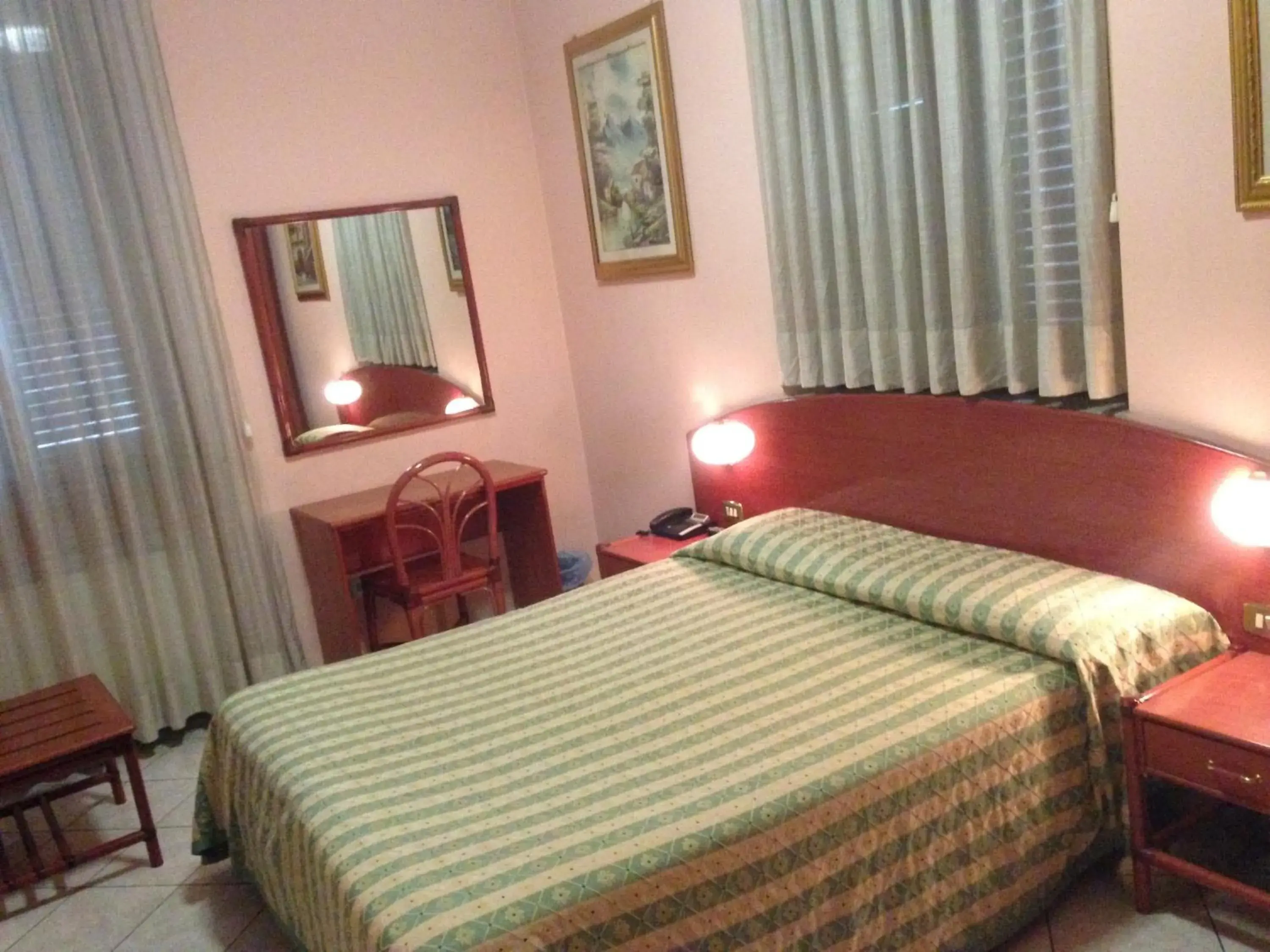 Bed in Hotel La Caravella