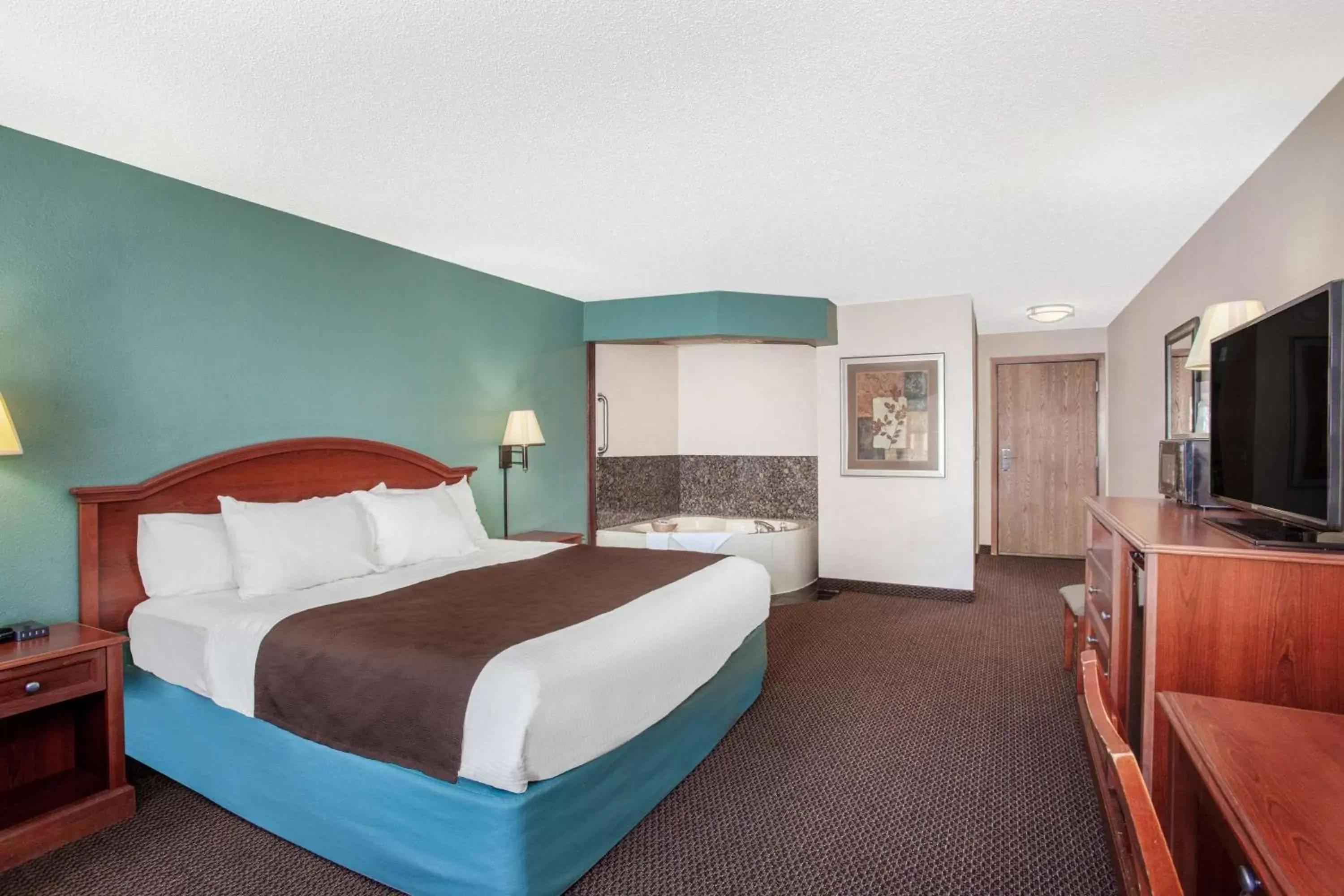 Photo of the whole room, Bed in AmericInn by Wyndham St. Peter