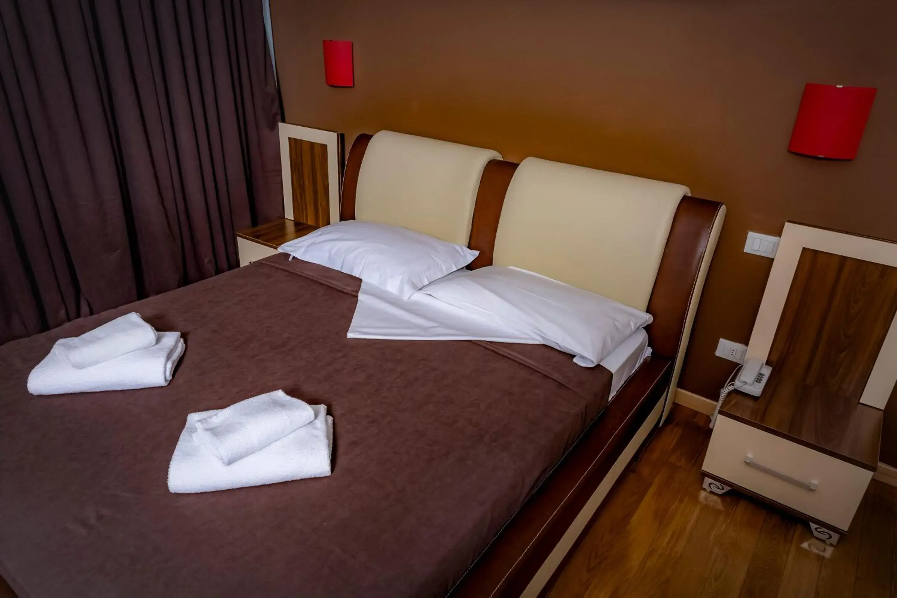 Bed in Hotel Trieste