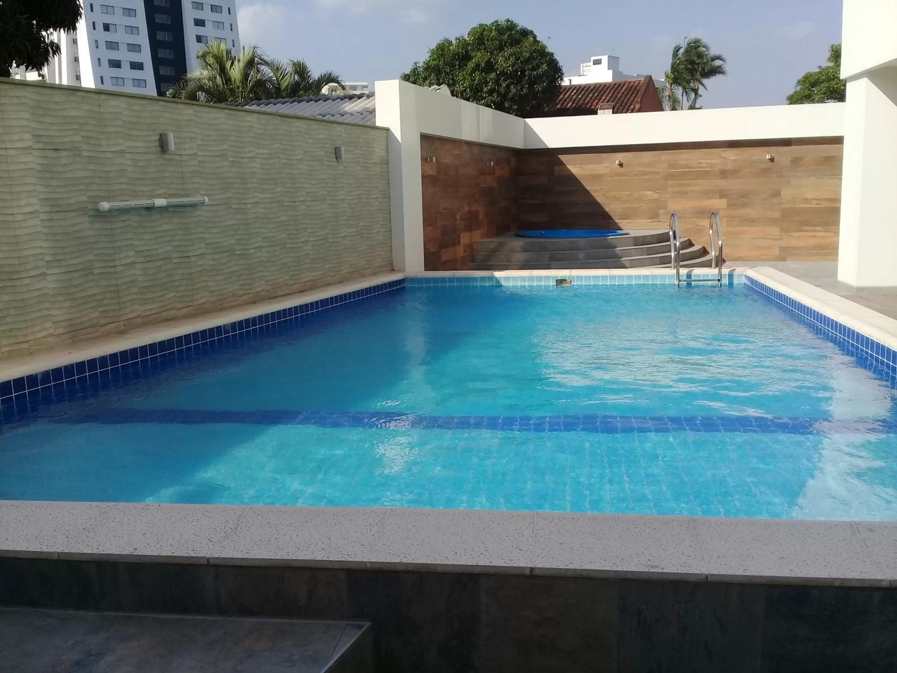 Swimming pool in Urban Suites Apart Hotel