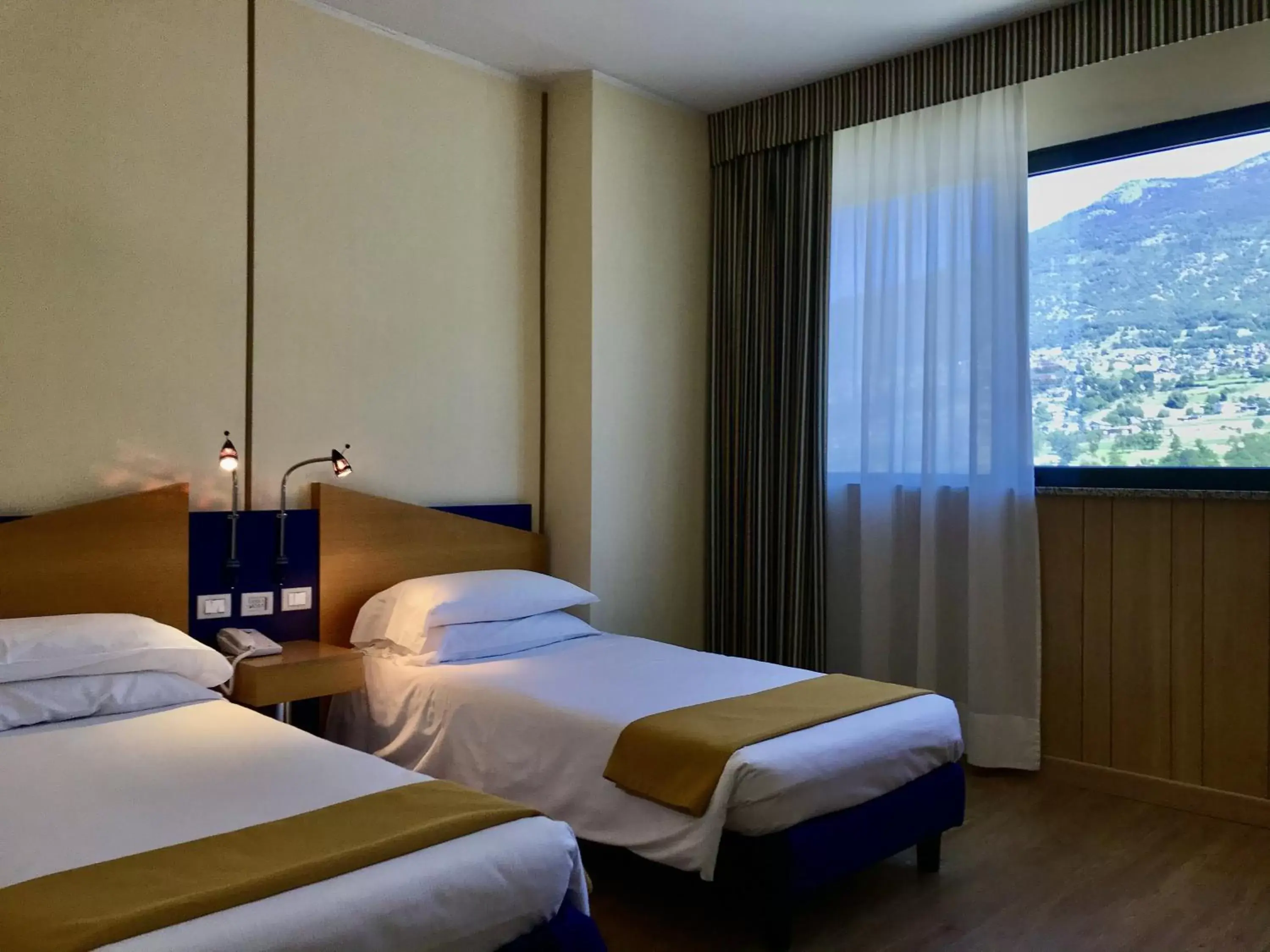 Photo of the whole room, Bed in Hotel Express Aosta East