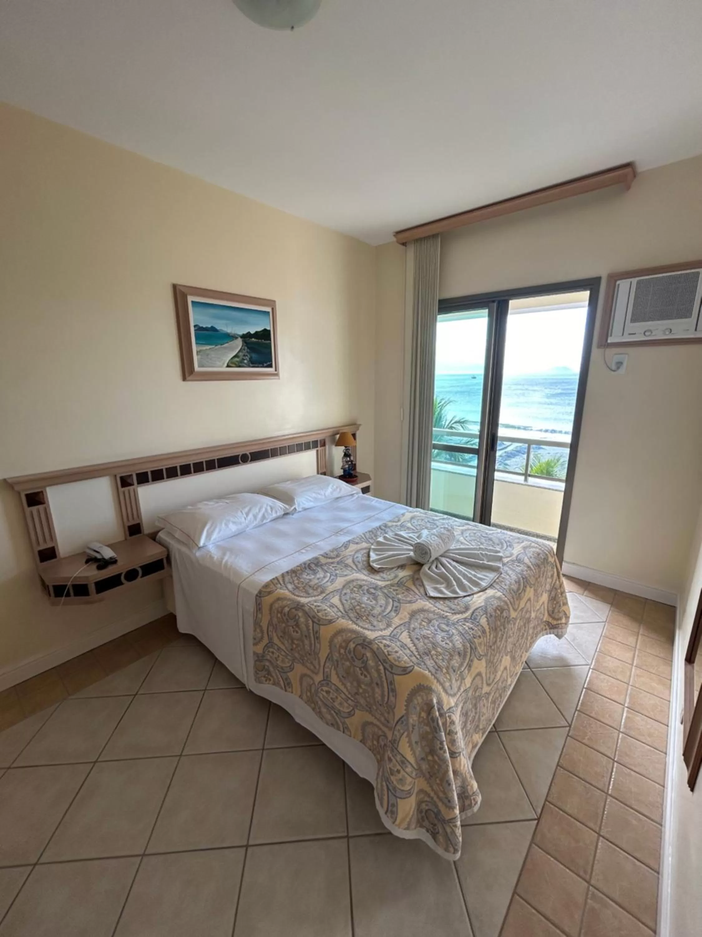 Bed in Golfinhos Apart Hotel