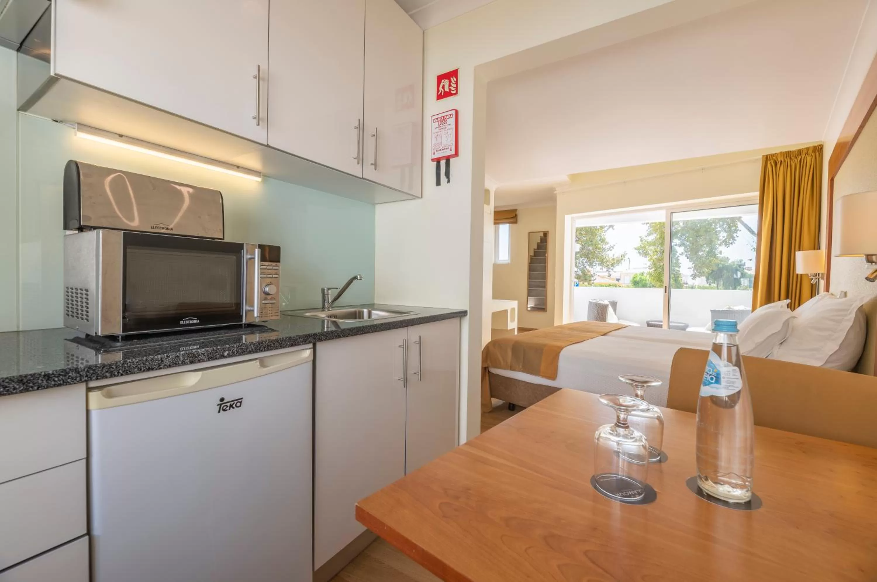 Kitchen or kitchenette in Lagoa Hotel
