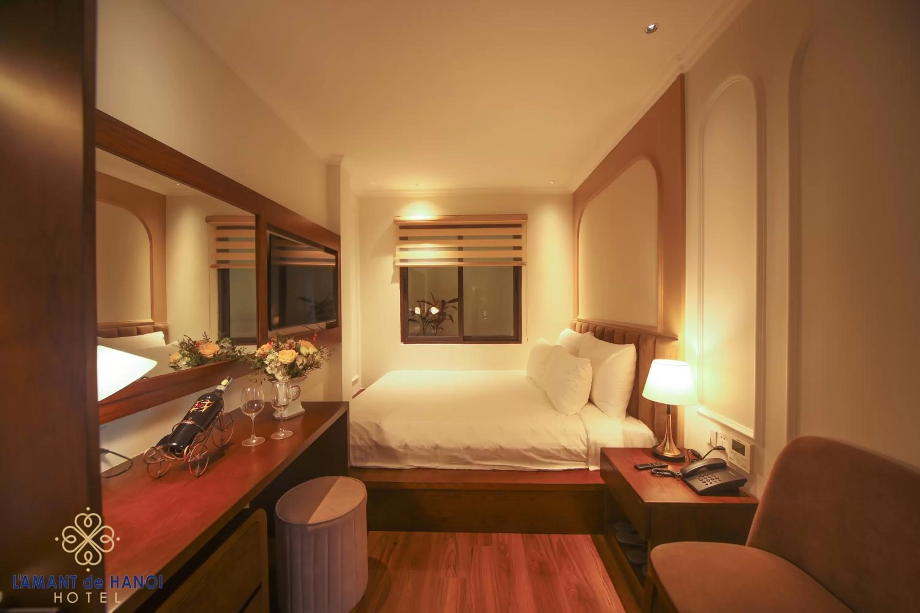 Bed in L'amant de Hanoi Hotel - khách sạn Lamant de Hà Nội