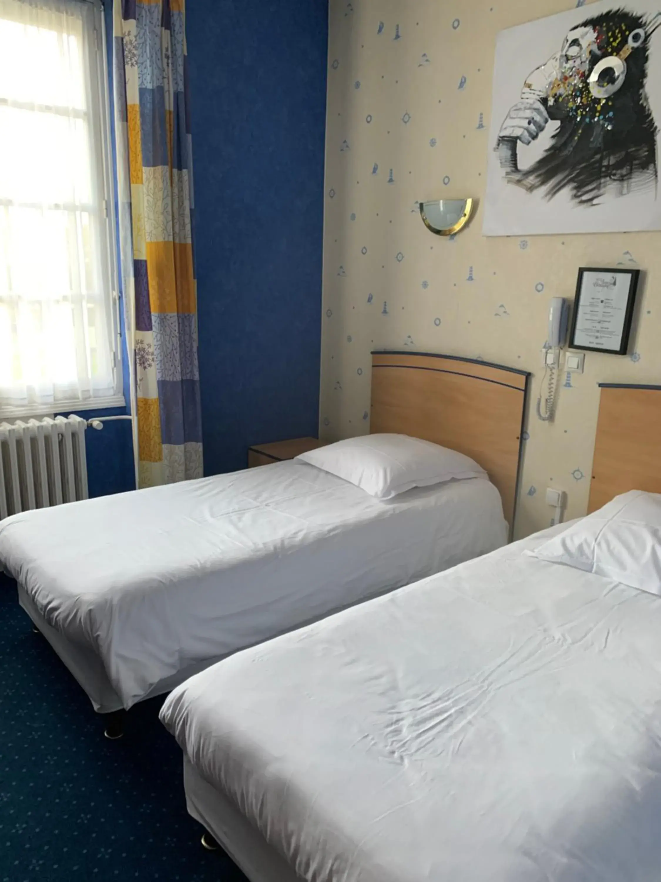 Twin Room 10m2 in Hotel Anne De Bretagne BLOIS Twin Room 10m2 in Hotel Anne De Bretagne BLOIS