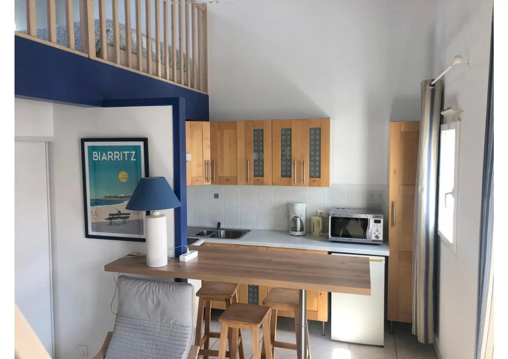 Kitchen or kitchenette in Hôtel & Appart-hôtel Olatua