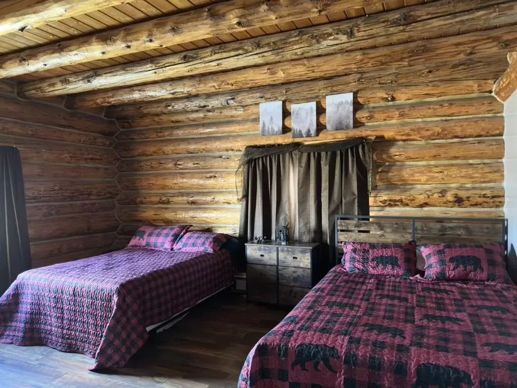 Bed in Sportsman Lodge Melrose MT