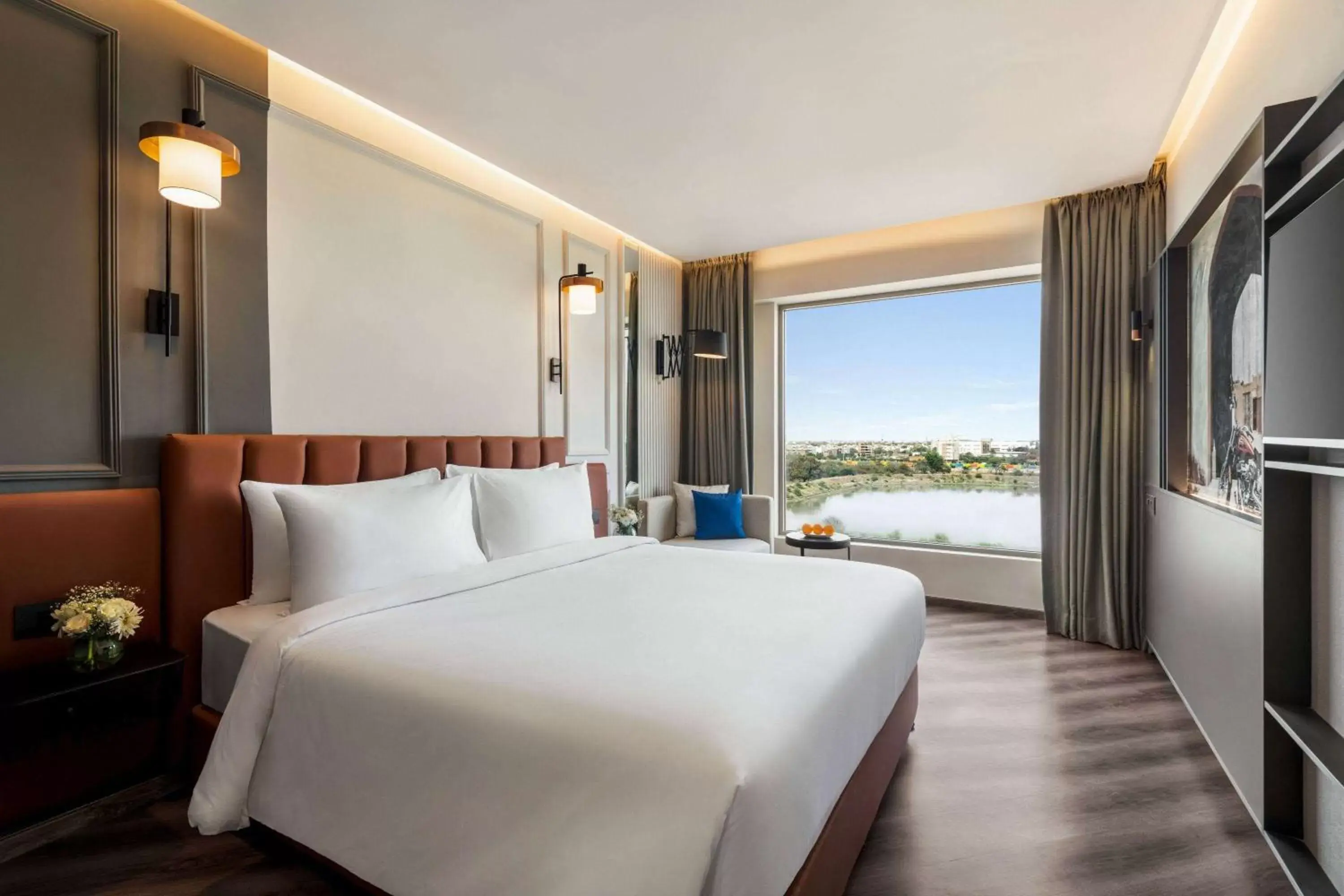 Photo of the whole room, Bed in Ramada Encore by Wyndham Indore Nipania Photo of the whole room, Bed in Ramada Encore by Wyndham Indore Nipania