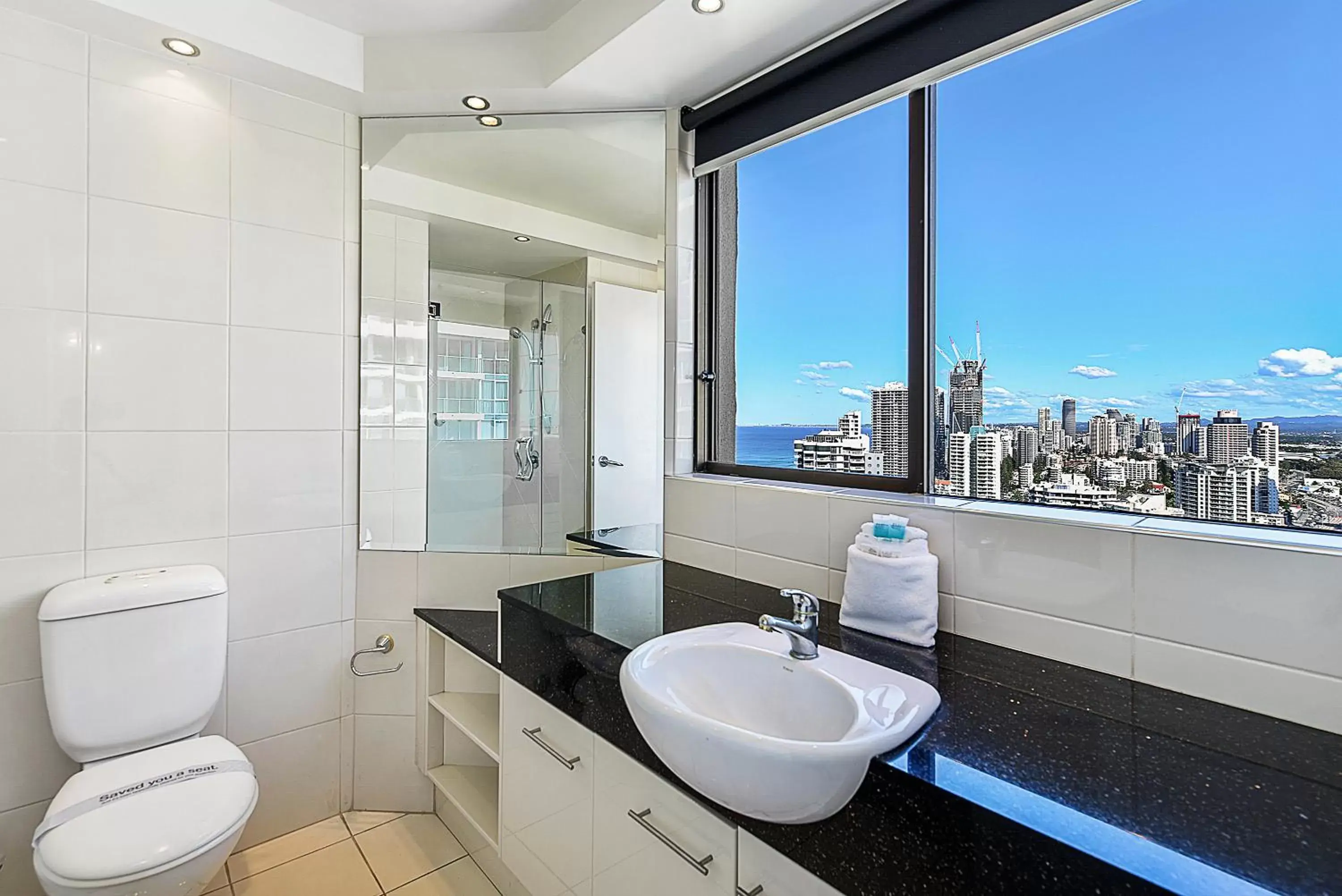 Toilet, Bathroom in Surfers Century Oceanside Apartments