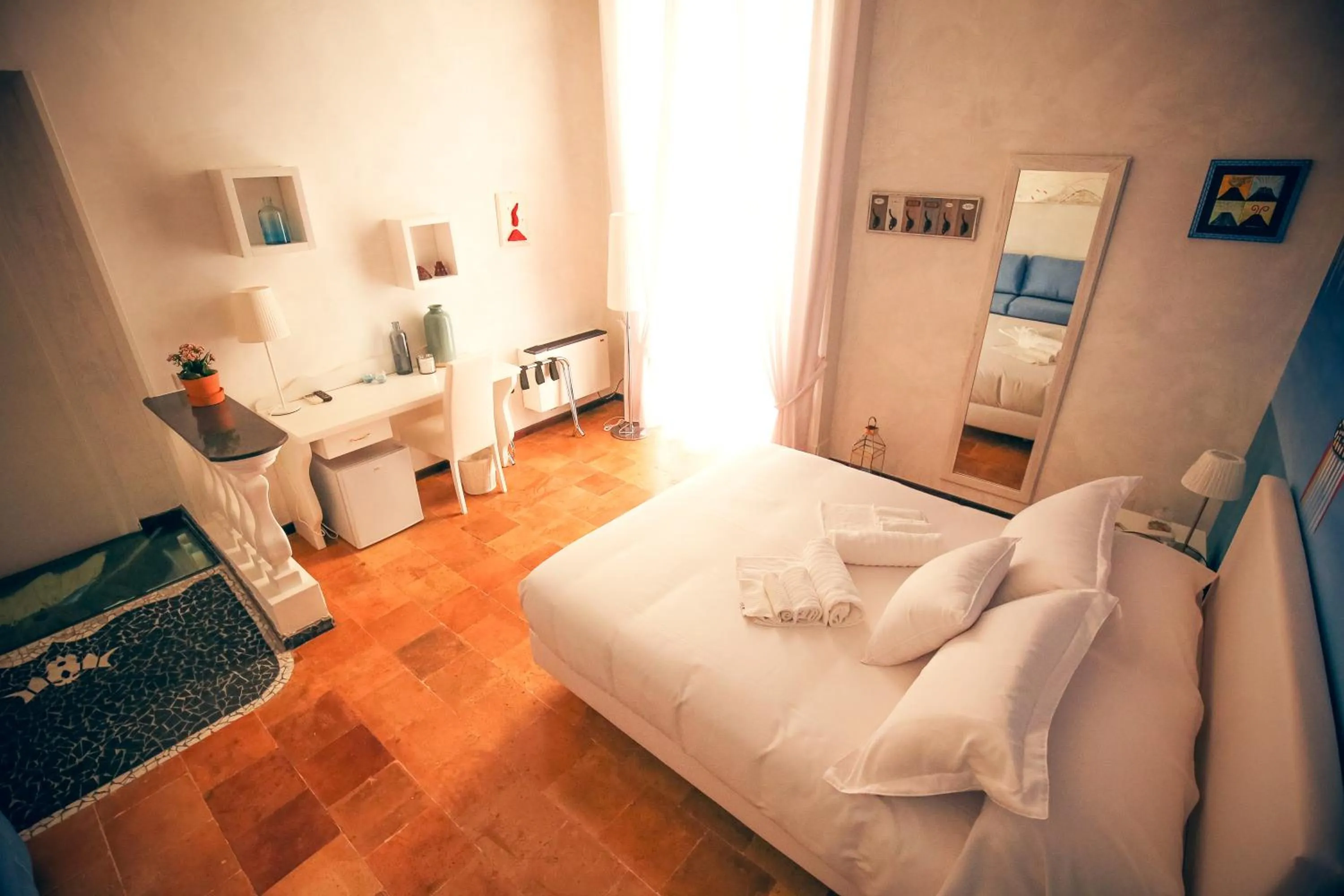 Bed in NapoliMia Boutique Hotel