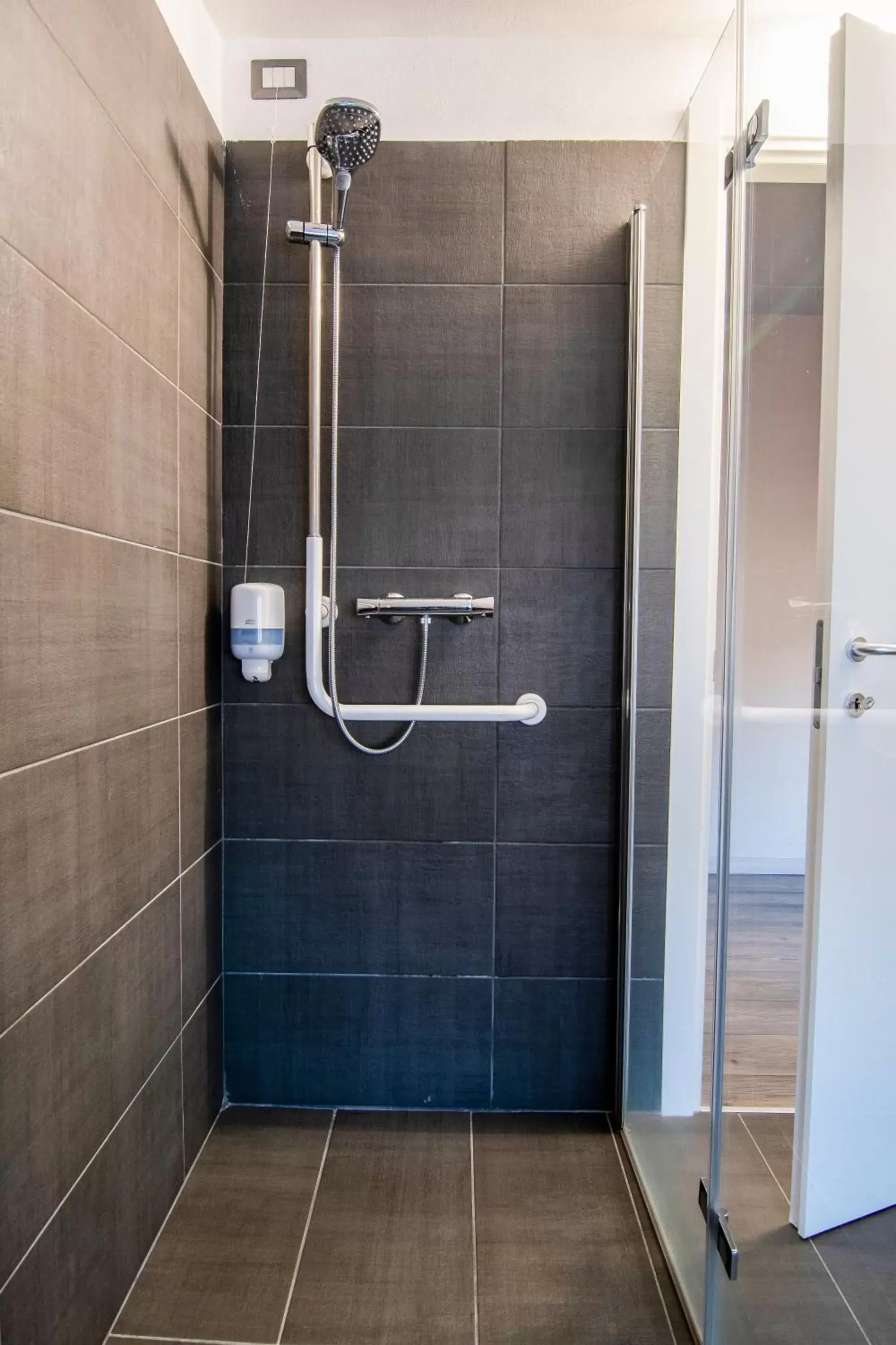 Shower, Bathroom in Hotel Saligari