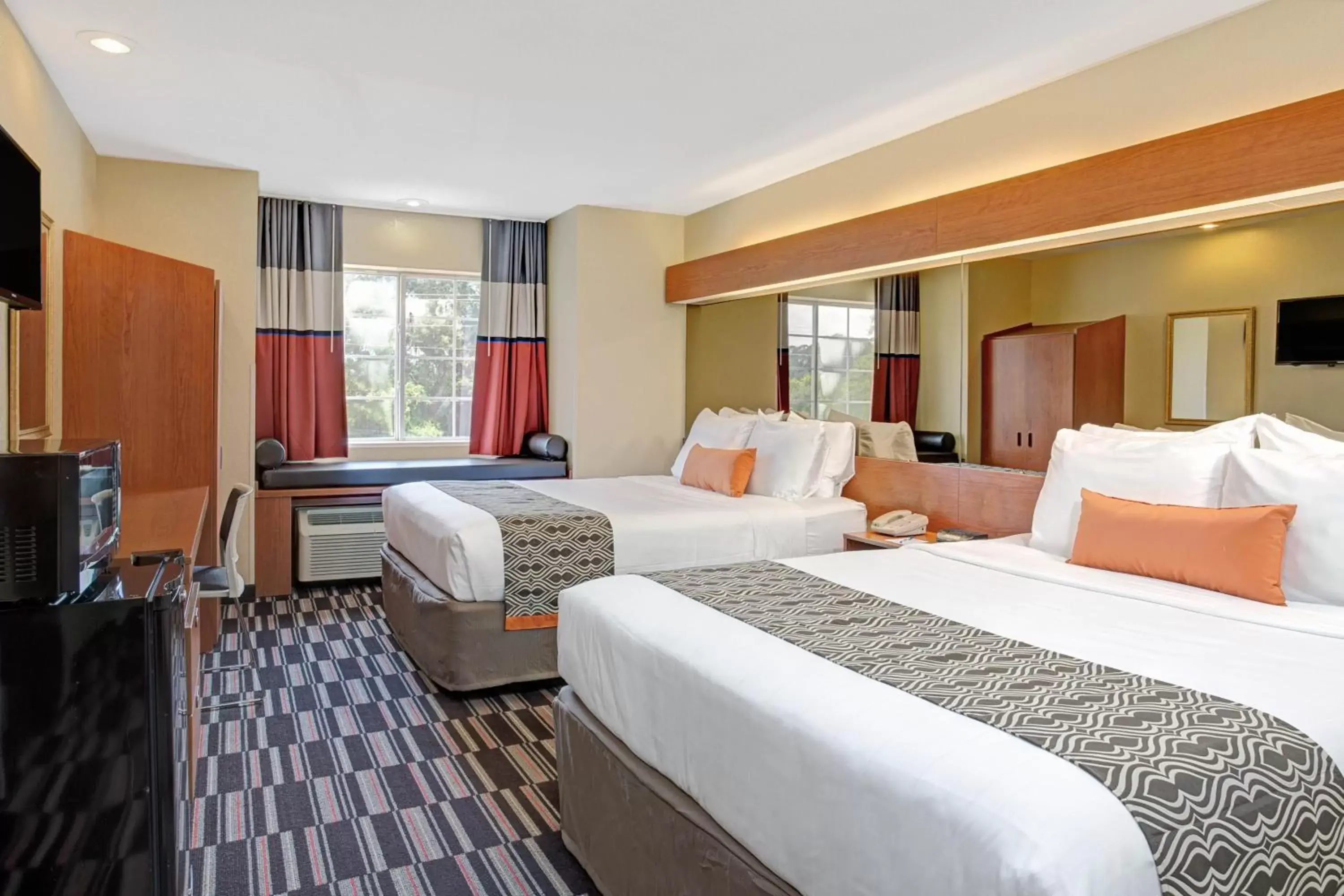 Queen Room with Two Queen Beds - Non-Smoking in Microtel Inn & Suites by Wyndham Bushnell