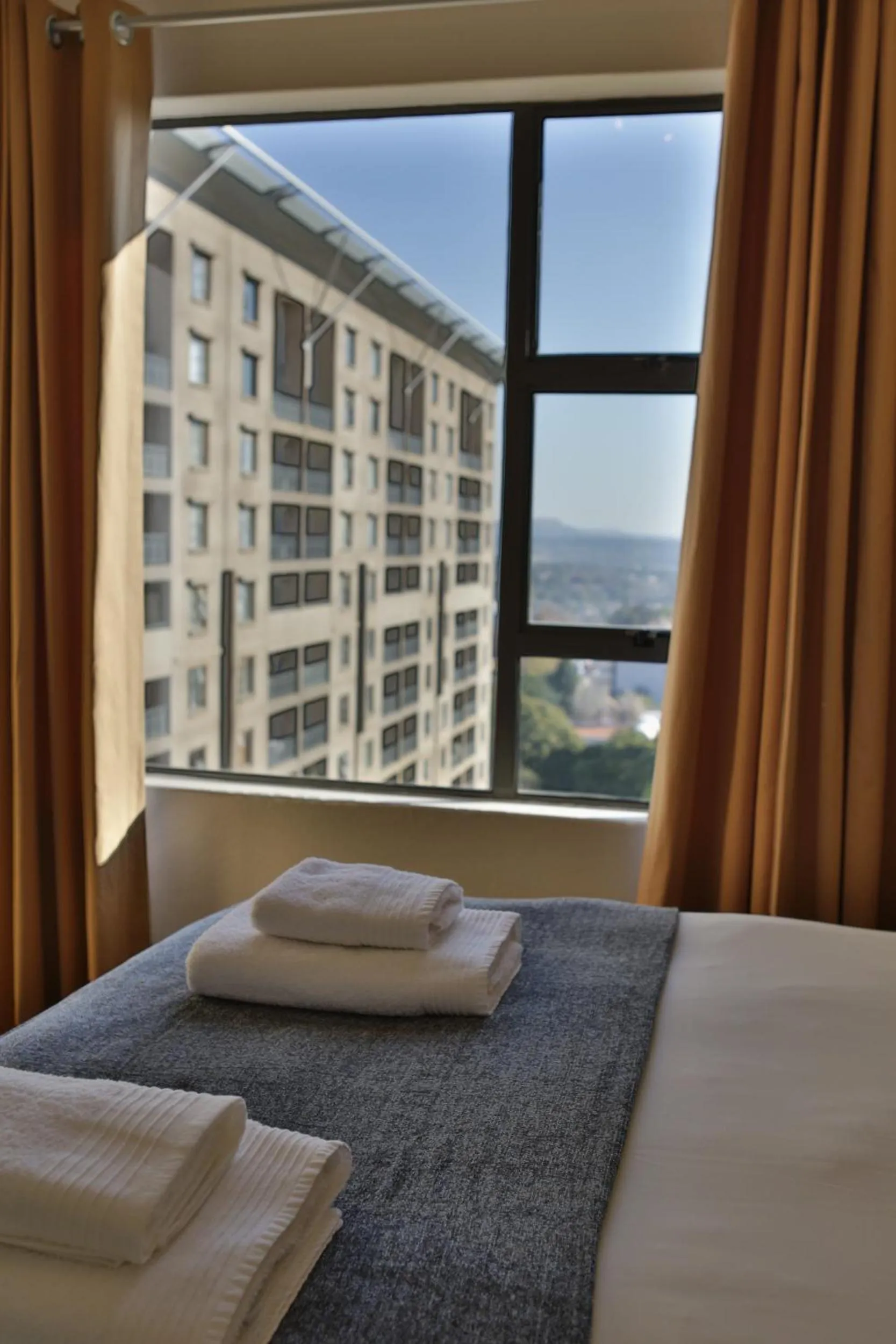 Bedroom, Bed in WeStay Westpoint Apartments