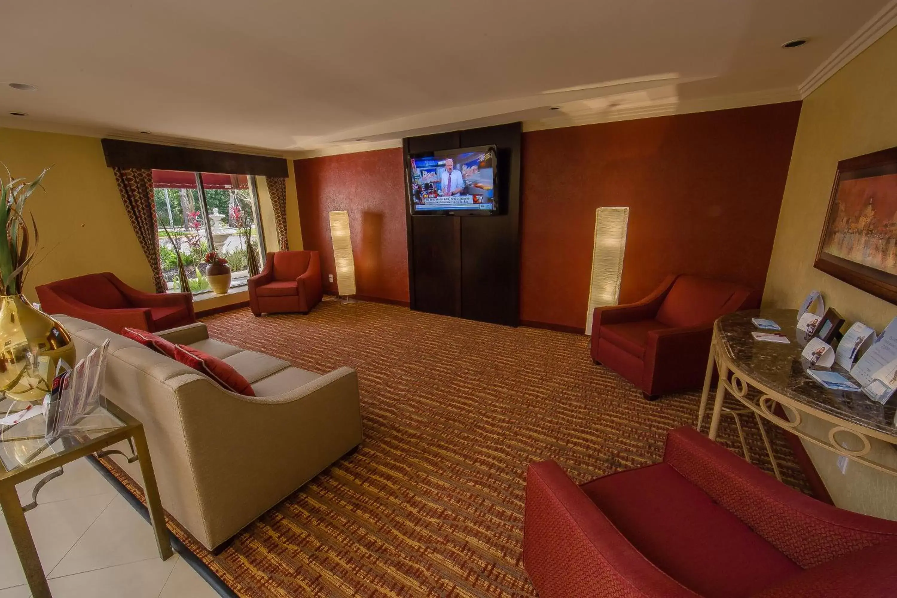 Communal lounge/ TV room, Seating Area in Ramada by Wyndham Houston Intercontinental Airport East