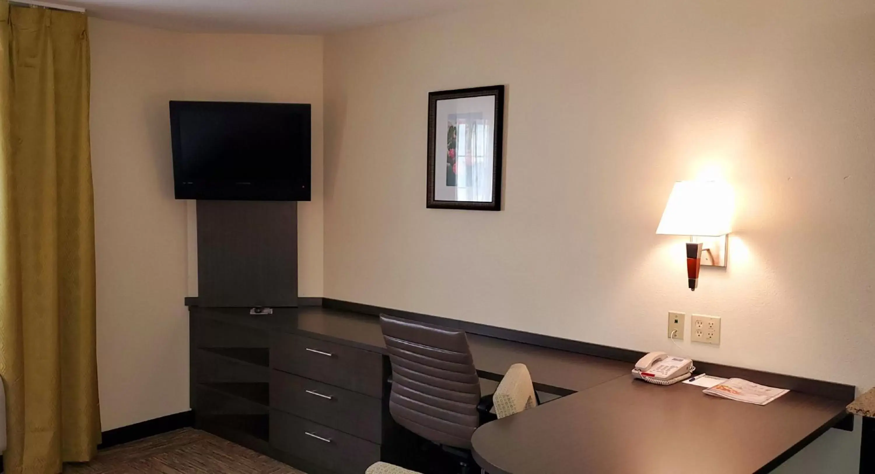 Photo of the whole room, TV/Entertainment Center in Candlewood Suites Houston Medical Center, an IHG Hotel