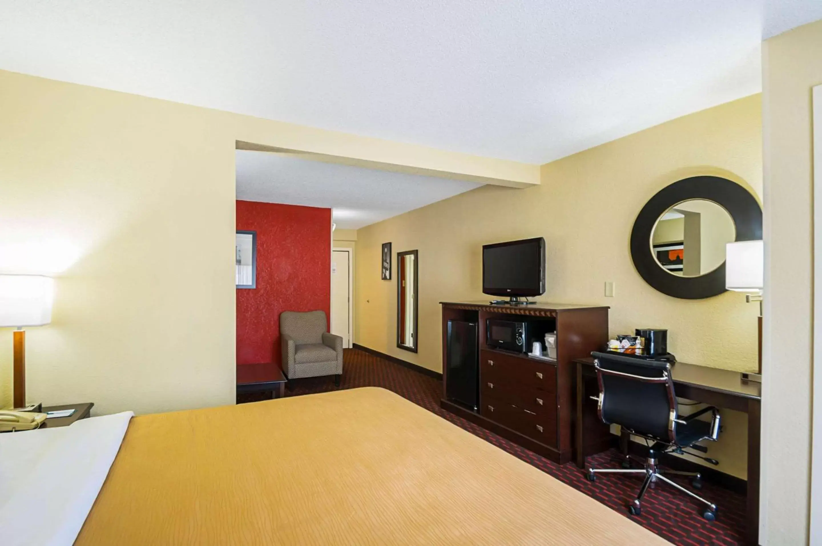 Photo of the whole room, TV/Entertainment Center in Quality Inn & Suites Hagerstown