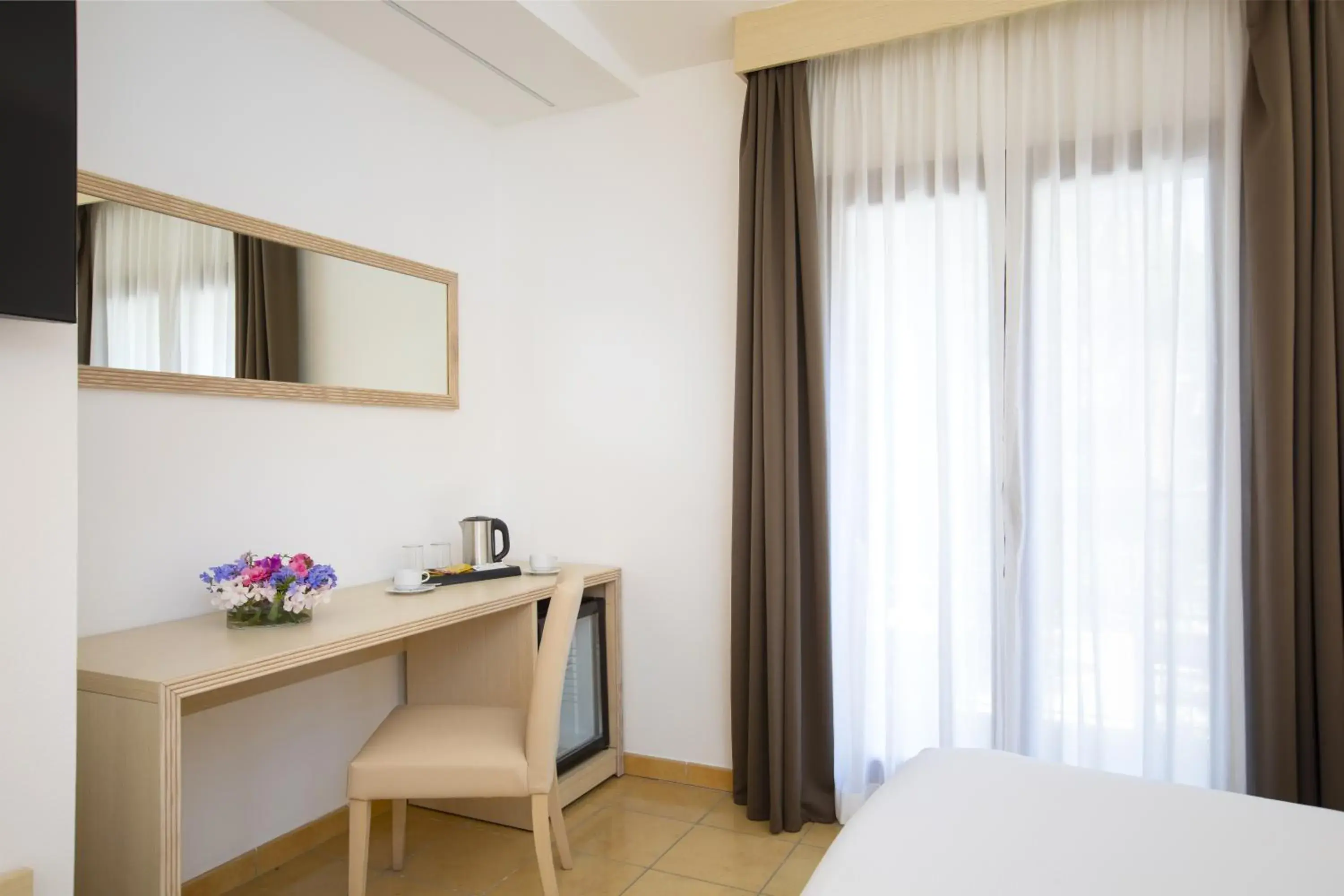 Bedroom, TV/Entertainment Center in Hotel Corte Rosada Resort & Spa