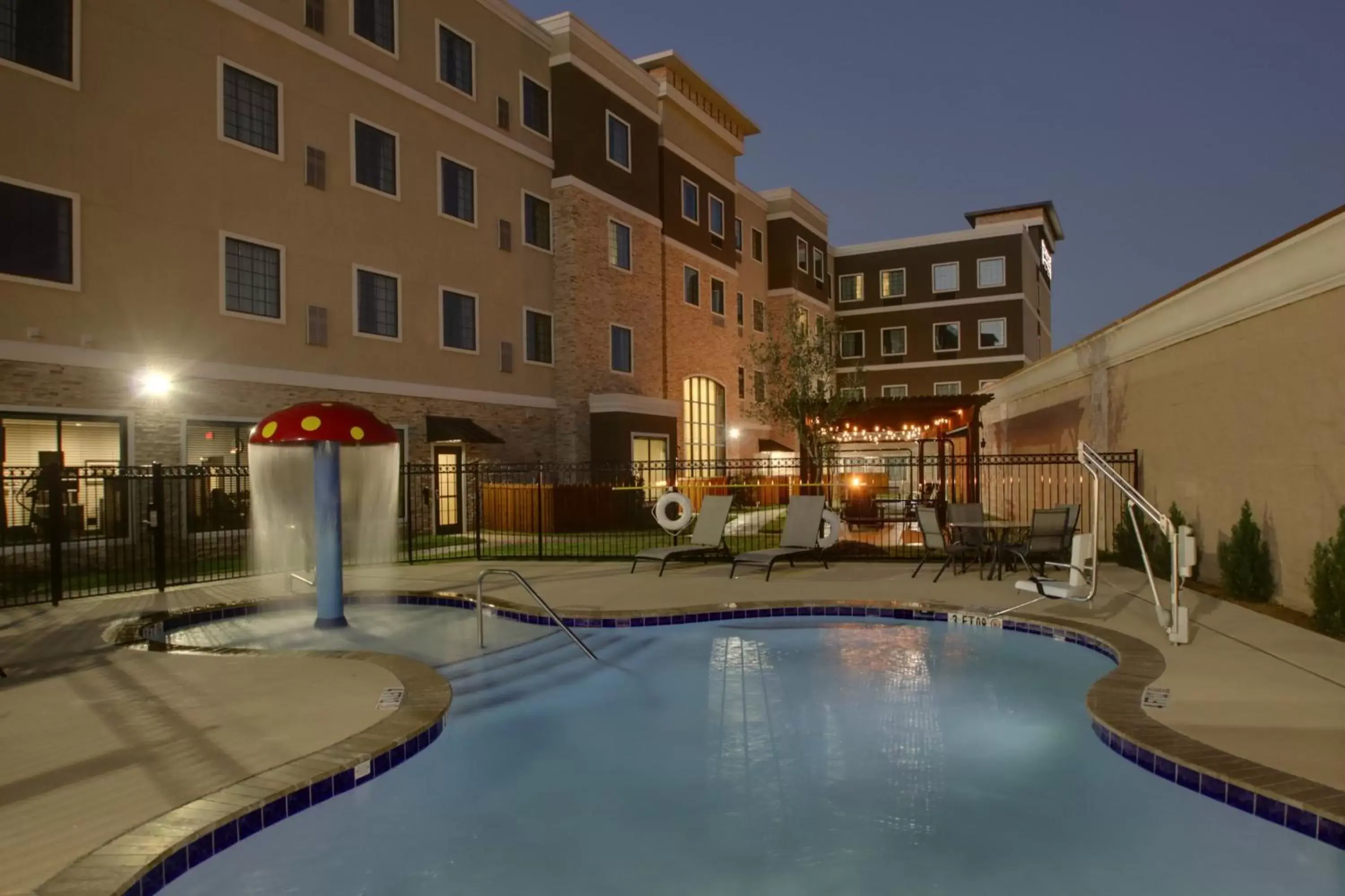 Swimming pool, Property Building in Staybridge Suites Plano - The Colony, an IHG Hotel