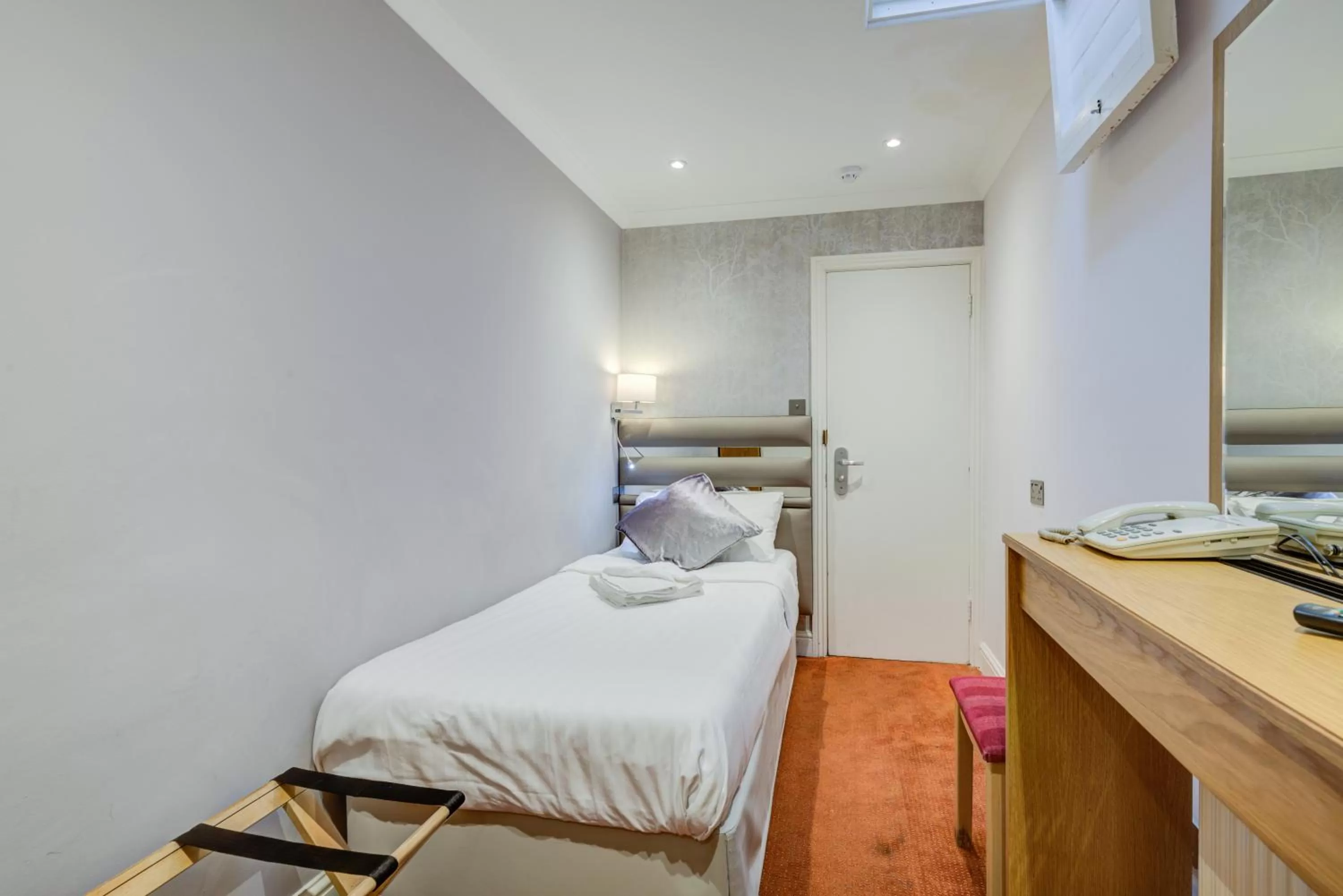 Bed in Admiral Hotel at Park Avenue