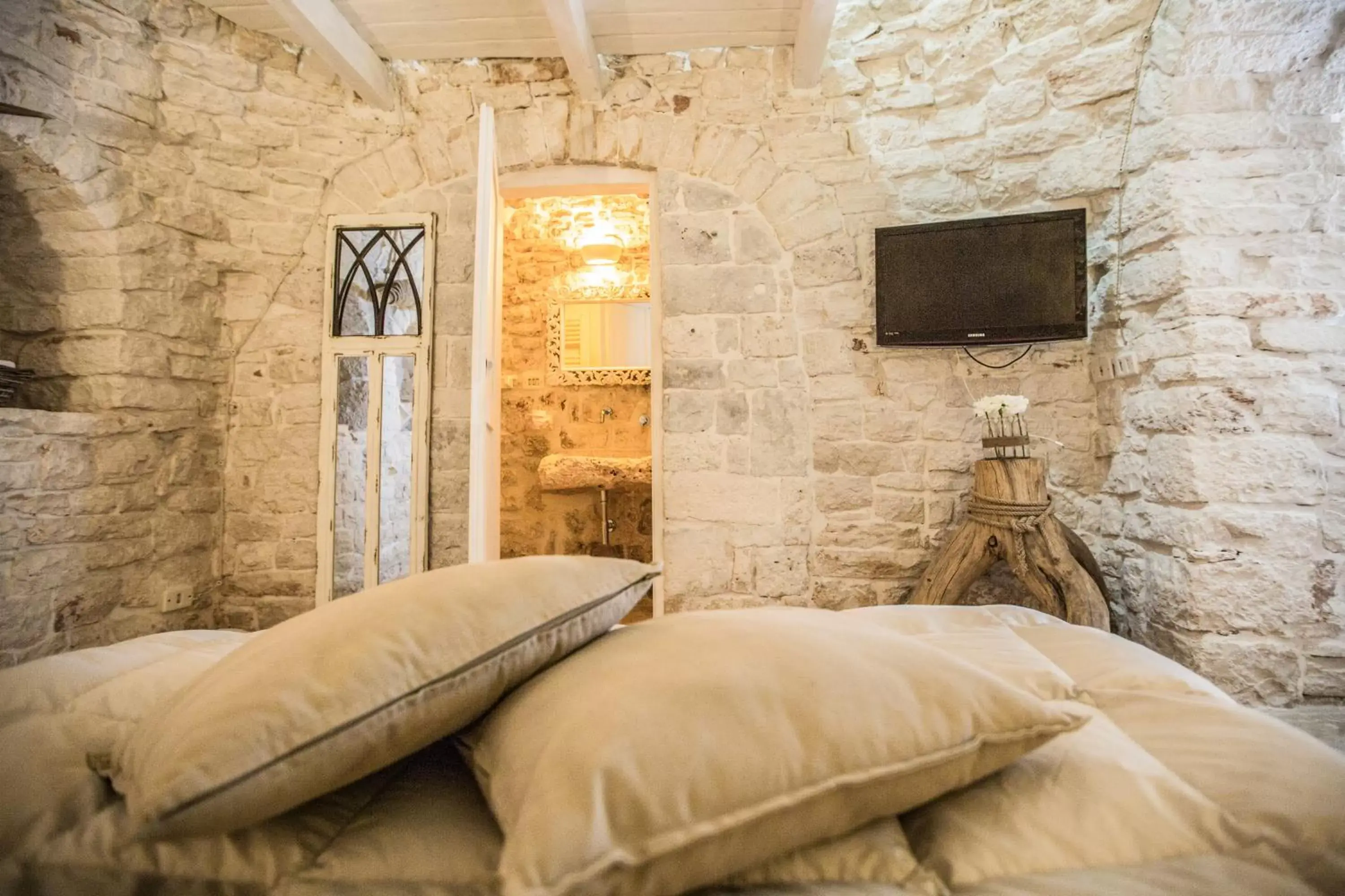 Bed in Trulli Antichi Mestieri - Widespread Trulli in the historic center