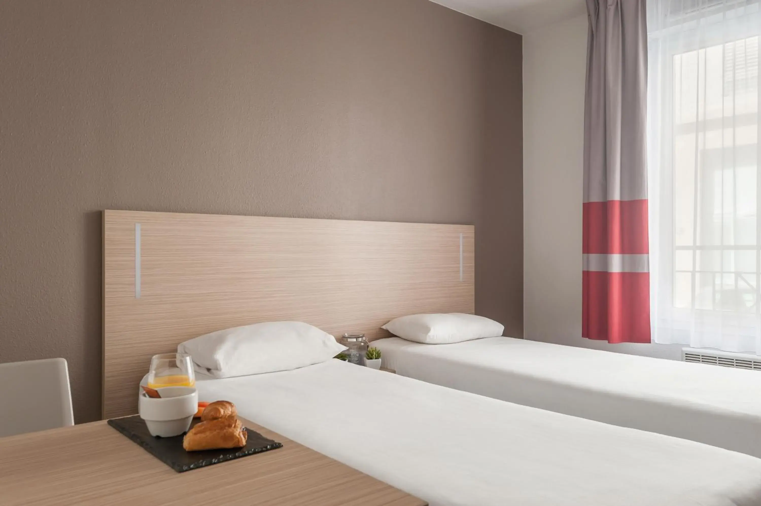 Bed, Room Photo in Appart'City Lyon Part Dieu Garibaldi