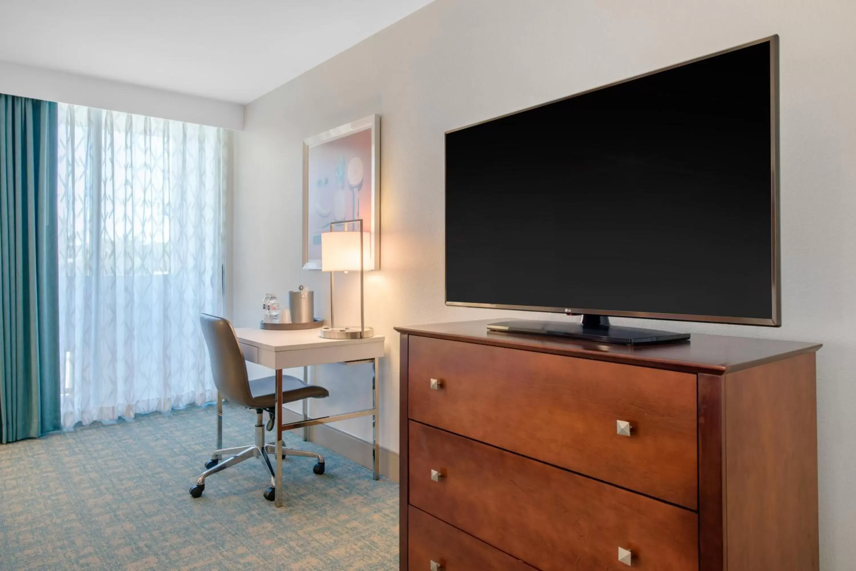 Photo of the whole room, TV/Entertainment Center in Holiday Inn Orlando – Disney Springs™ Area, an IHG Hotel