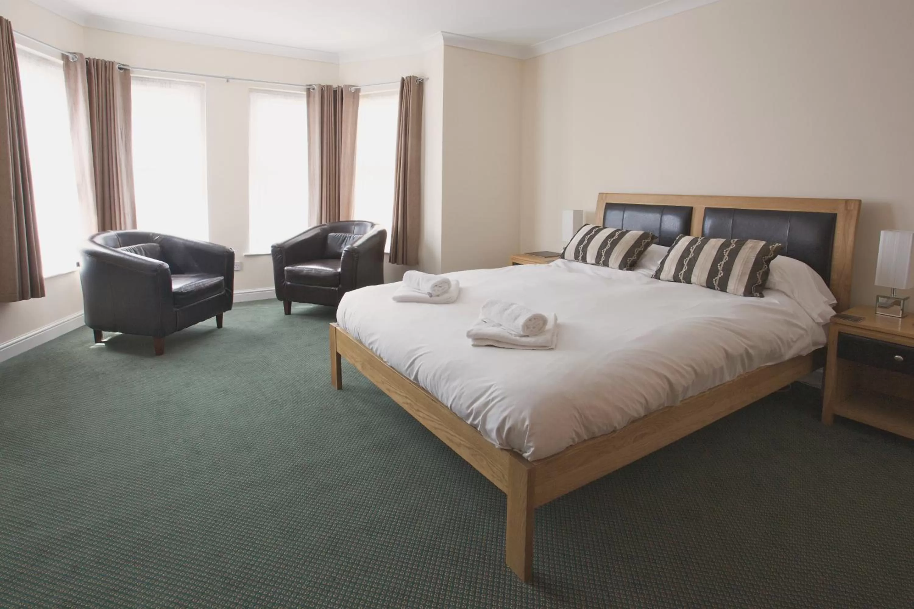 Bedroom in All Seasons Lodge Hotel