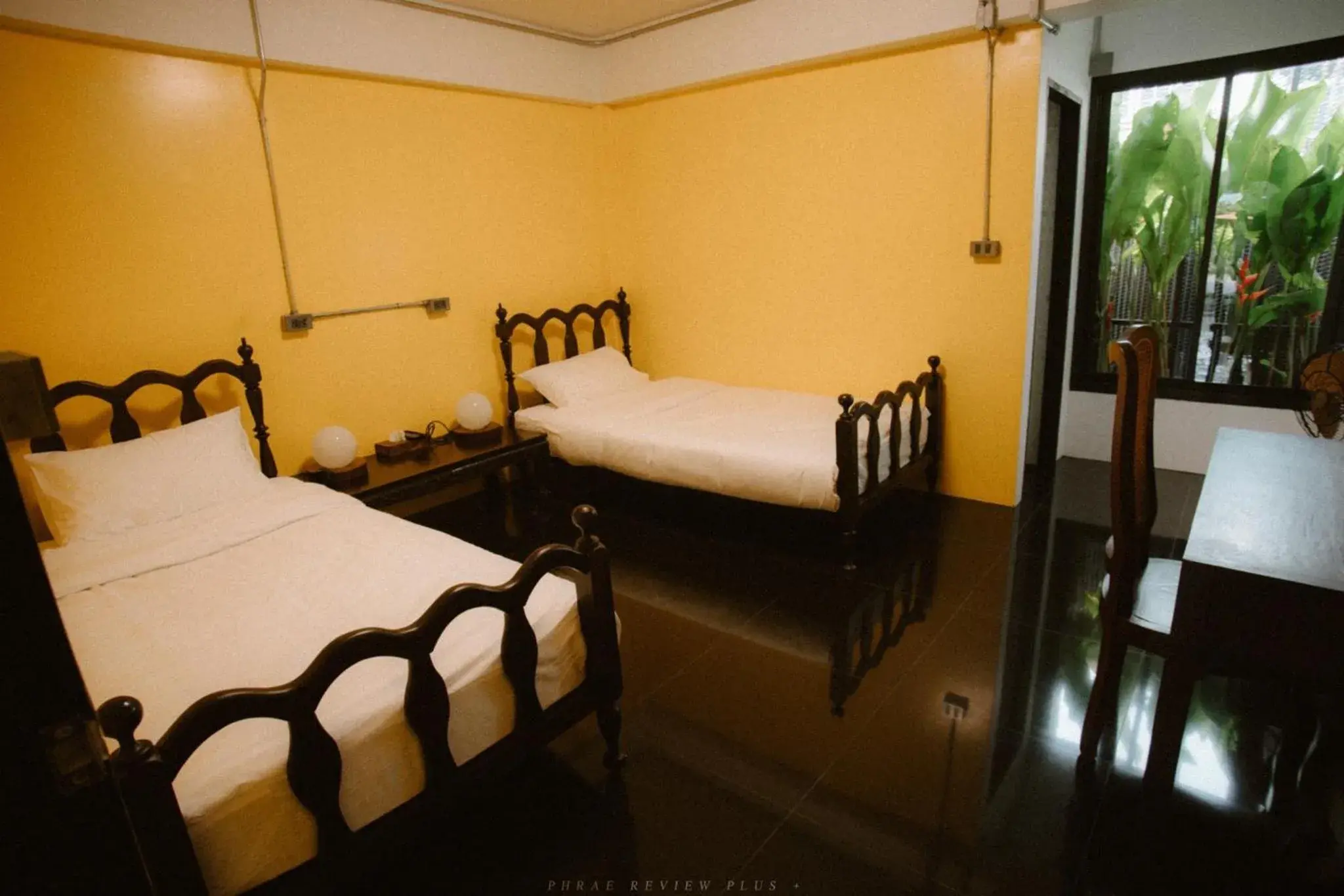 Bed in Baan Lung Poshtel