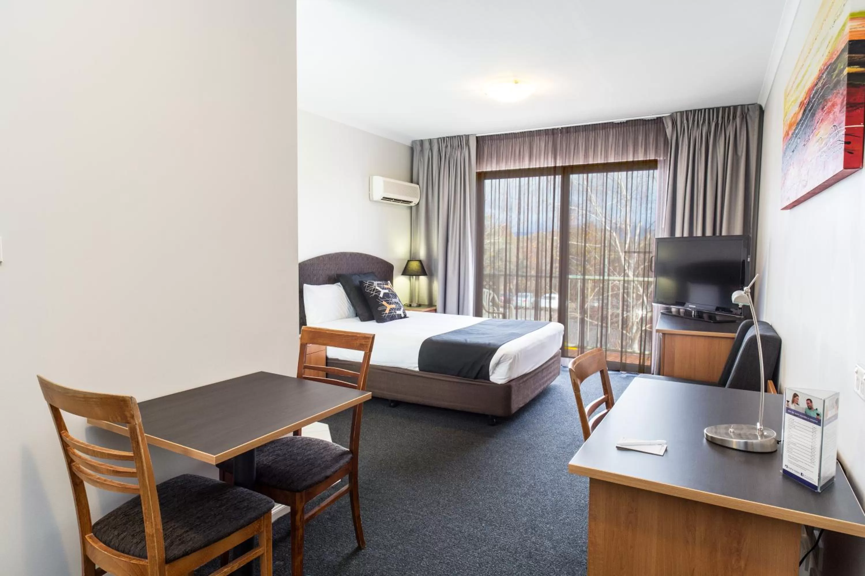 Bed in Alpha Hotel Canberra