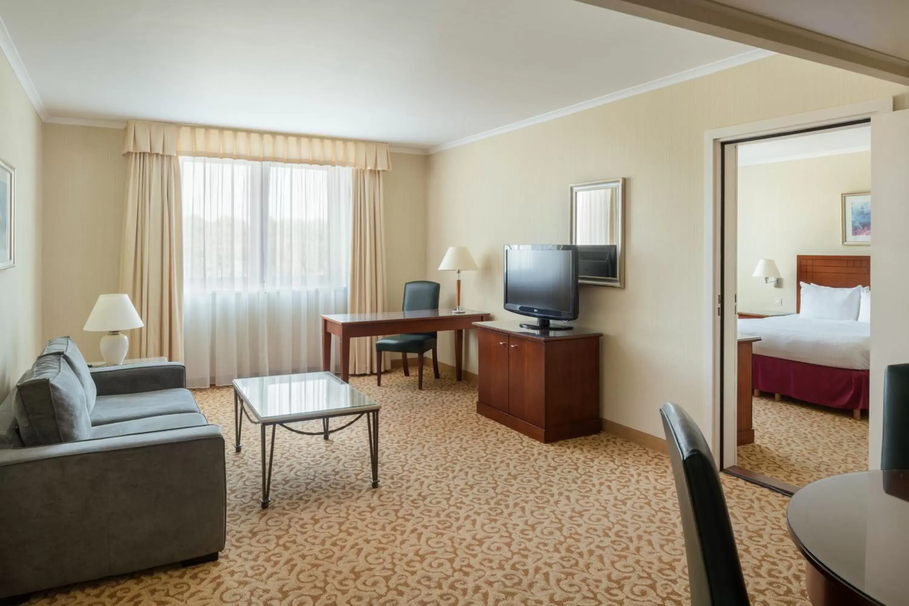 Photo of the whole room, TV/Entertainment Center in Paris Marriott Charles de Gaulle Airport Hotel