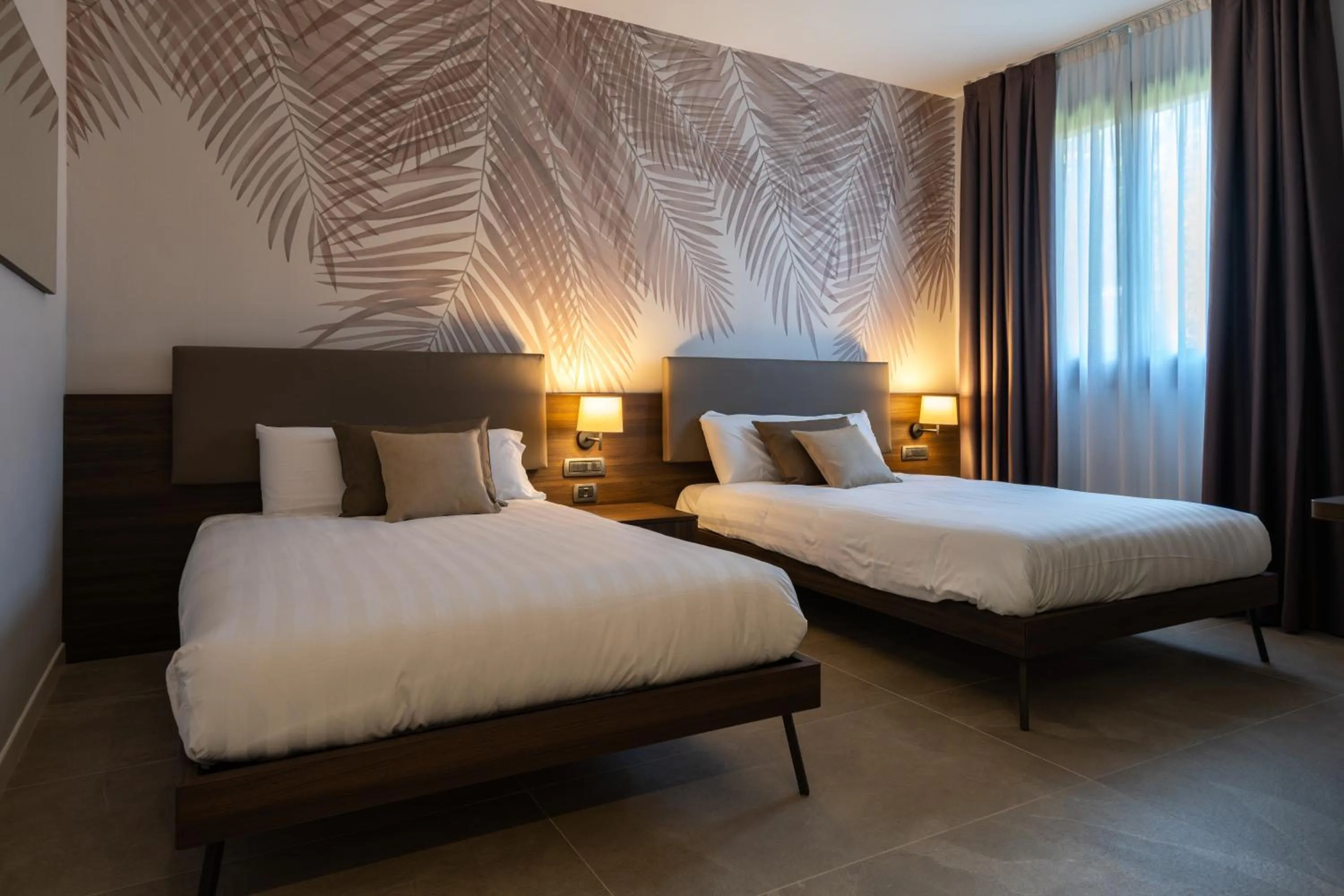 Bed in Ulivi Hotel & Residence