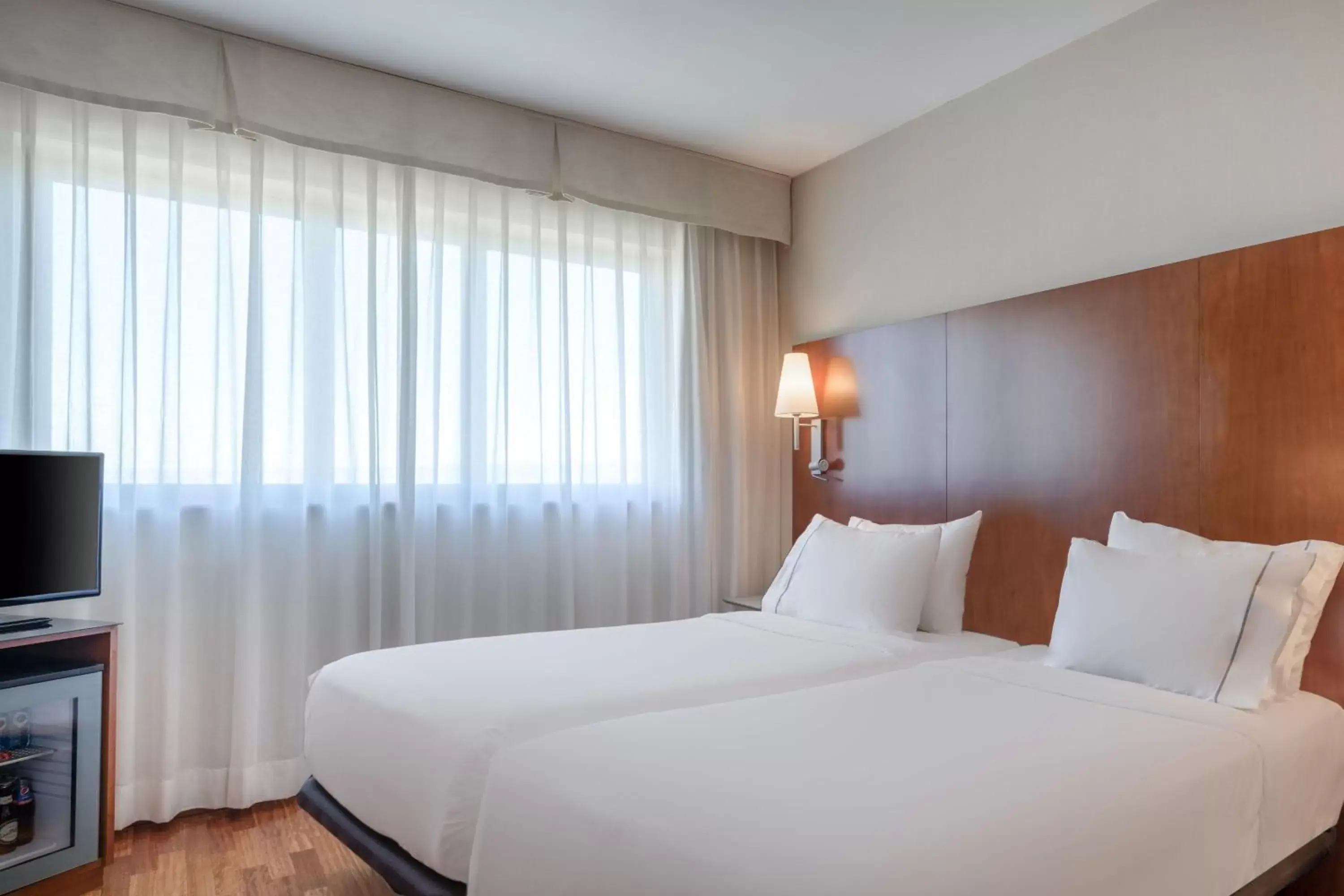 Photo of the whole room, Bed in AC Hotel Alcalá de Henares by Marriott