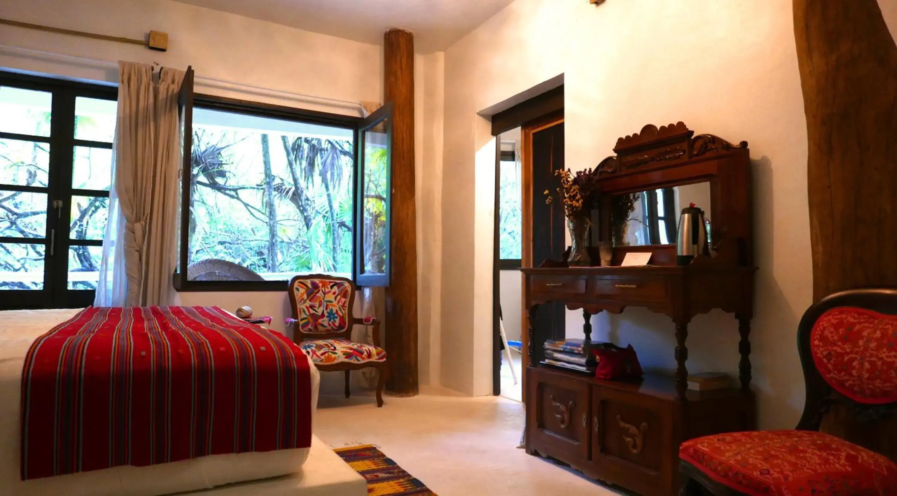 Photo of the whole room in Casa Ambar Tulum - Great location and access to a Private Cenote & Beach 2 Km Away - Adults Only