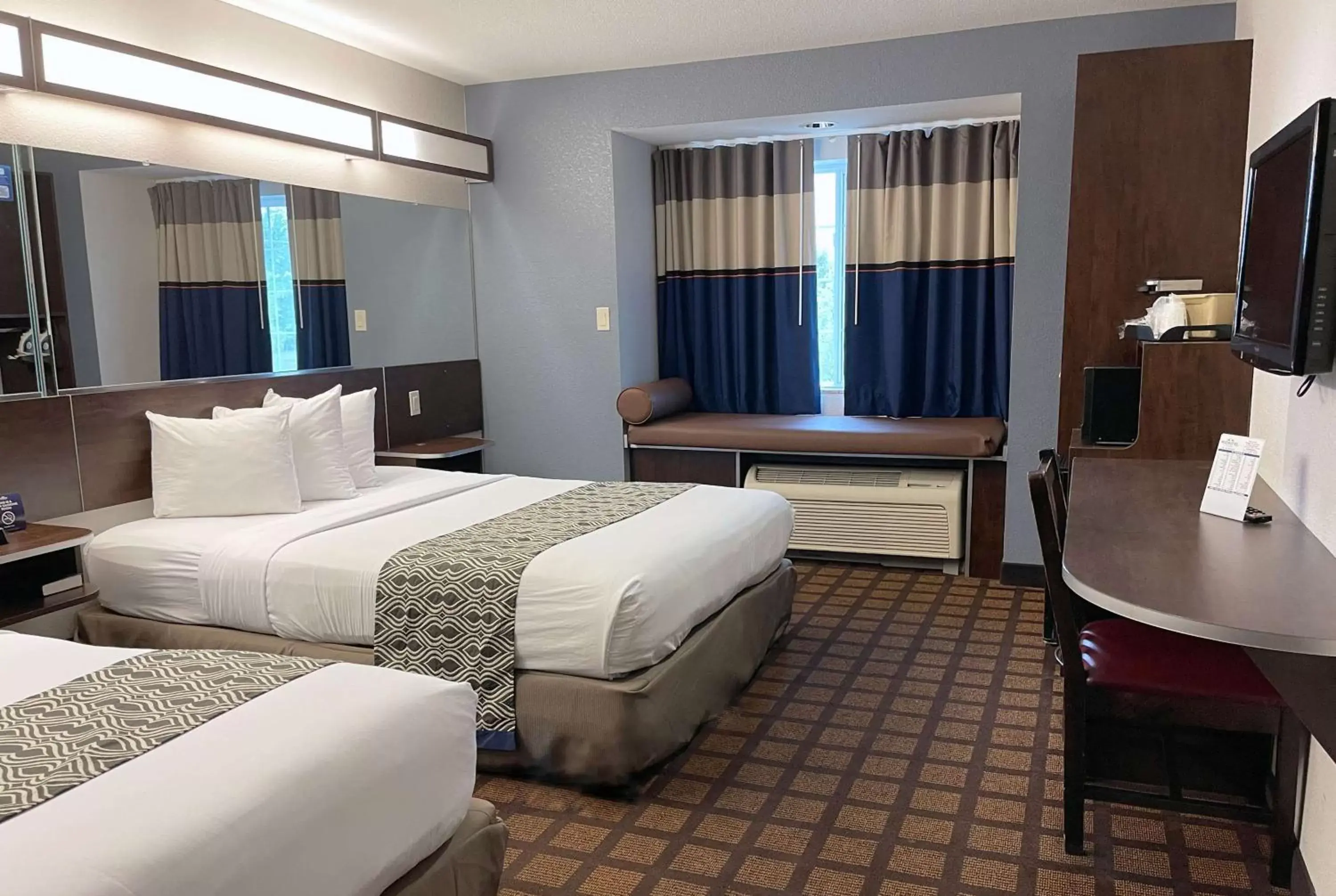 Photo of the whole room, Bed in Microtel Inn & Suites by Wyndham Michigan City