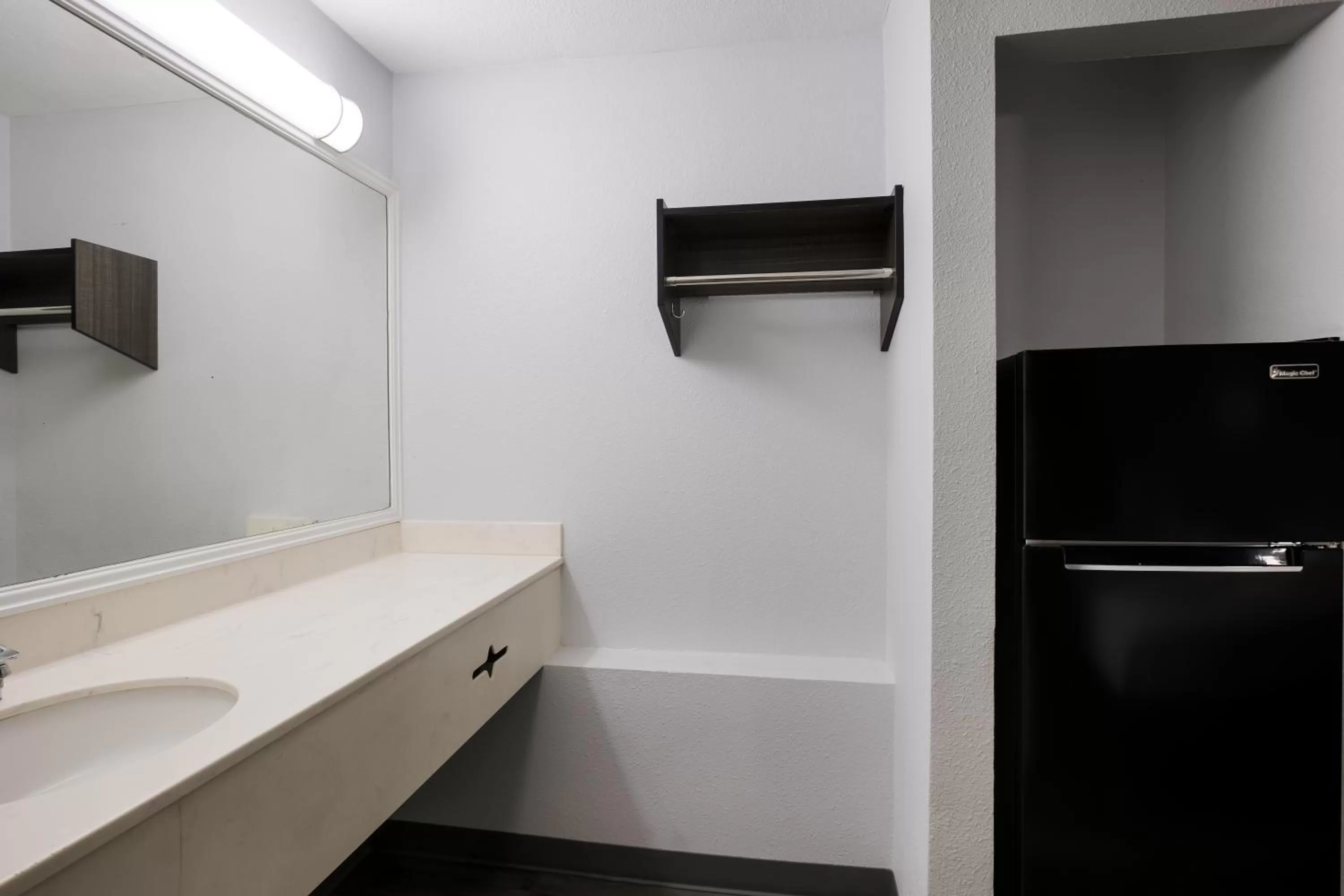 Bathroom in Suburban Studios Hinesville - Fort Stewart Area