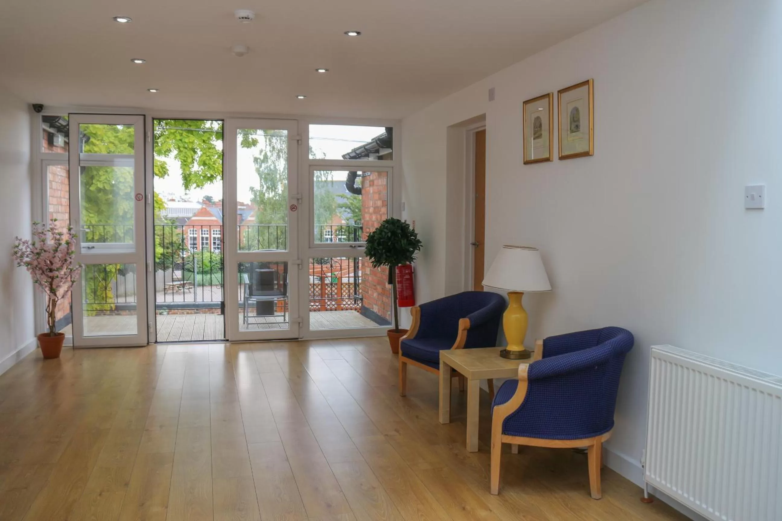 Communal lounge/ TV room in Oscar Lodge