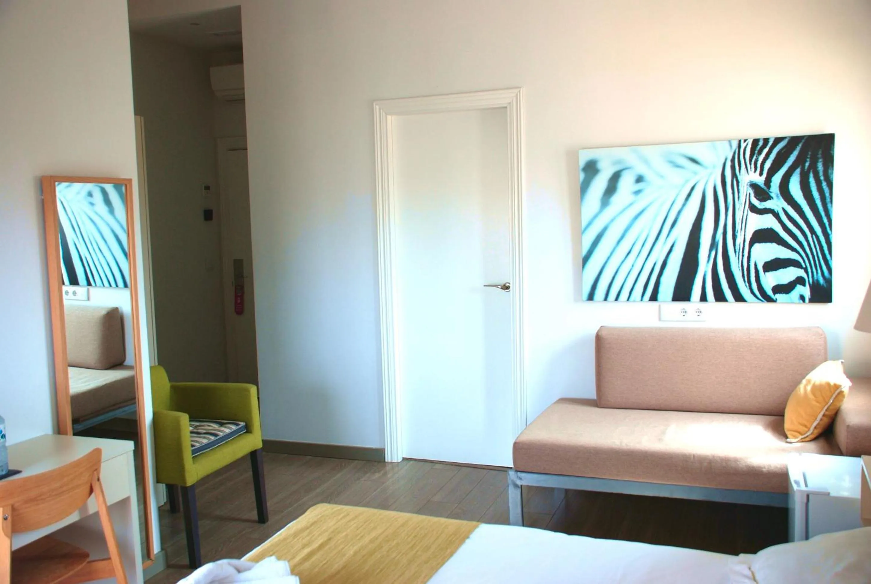 Bed in Hotel San Lorenzo Boutique Plaza